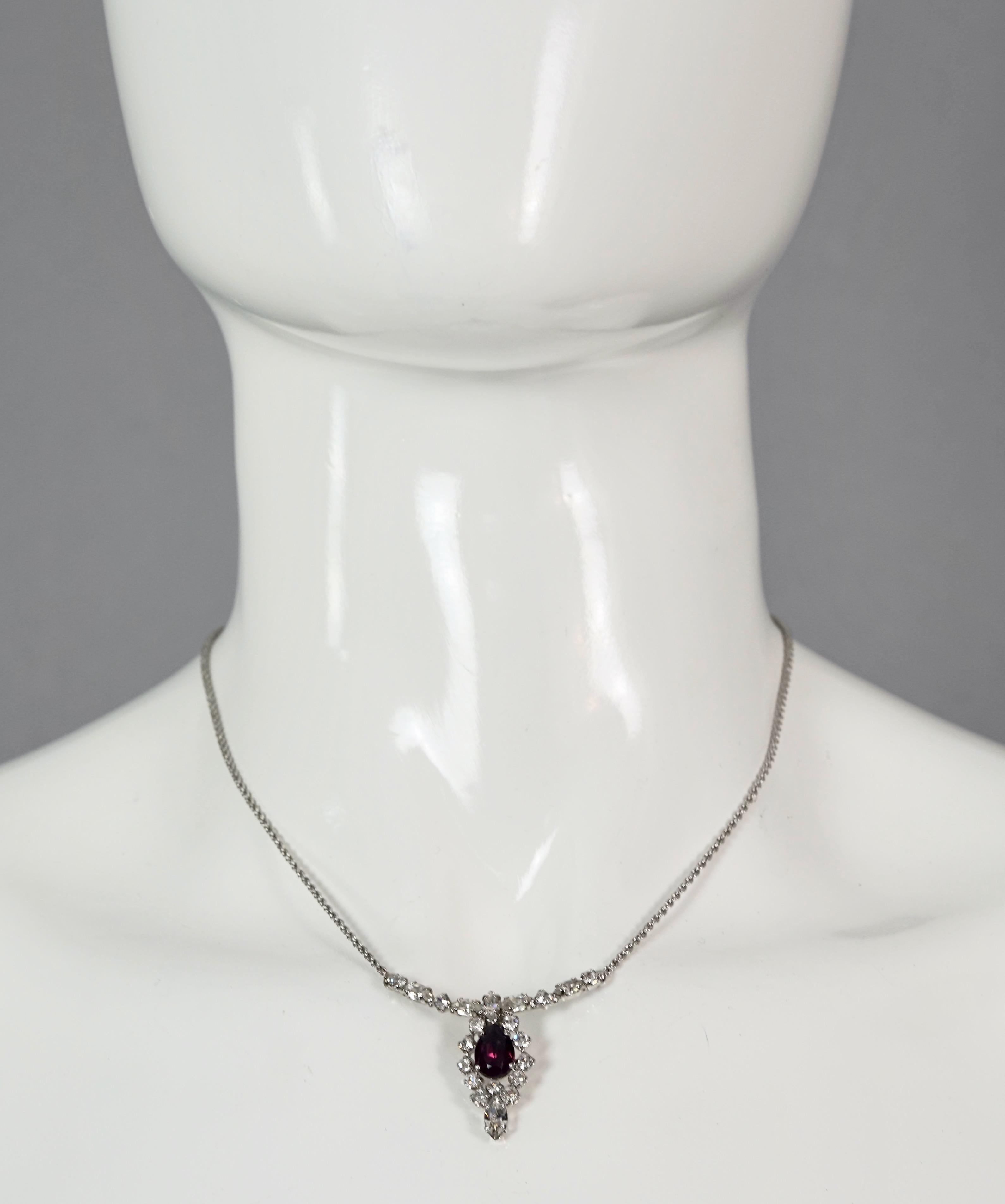 Vintage CHRISTIAN DIOR Purple Amethyst Rhinestone Necklace

Measurements:
Height: 1.29 inches (3.3 cm cm)
Wearable Length: 14.76 inches to 16.14 inches (37.5 cm to 41 cm)

Features:
- 100% Authentic CHRISTIAN DIOR.
- Purple amethyst pear and clear