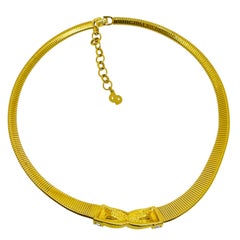 Collana firmata CHRISTIAN DIOR d'epoca con cristalli placcati oro e catena omega