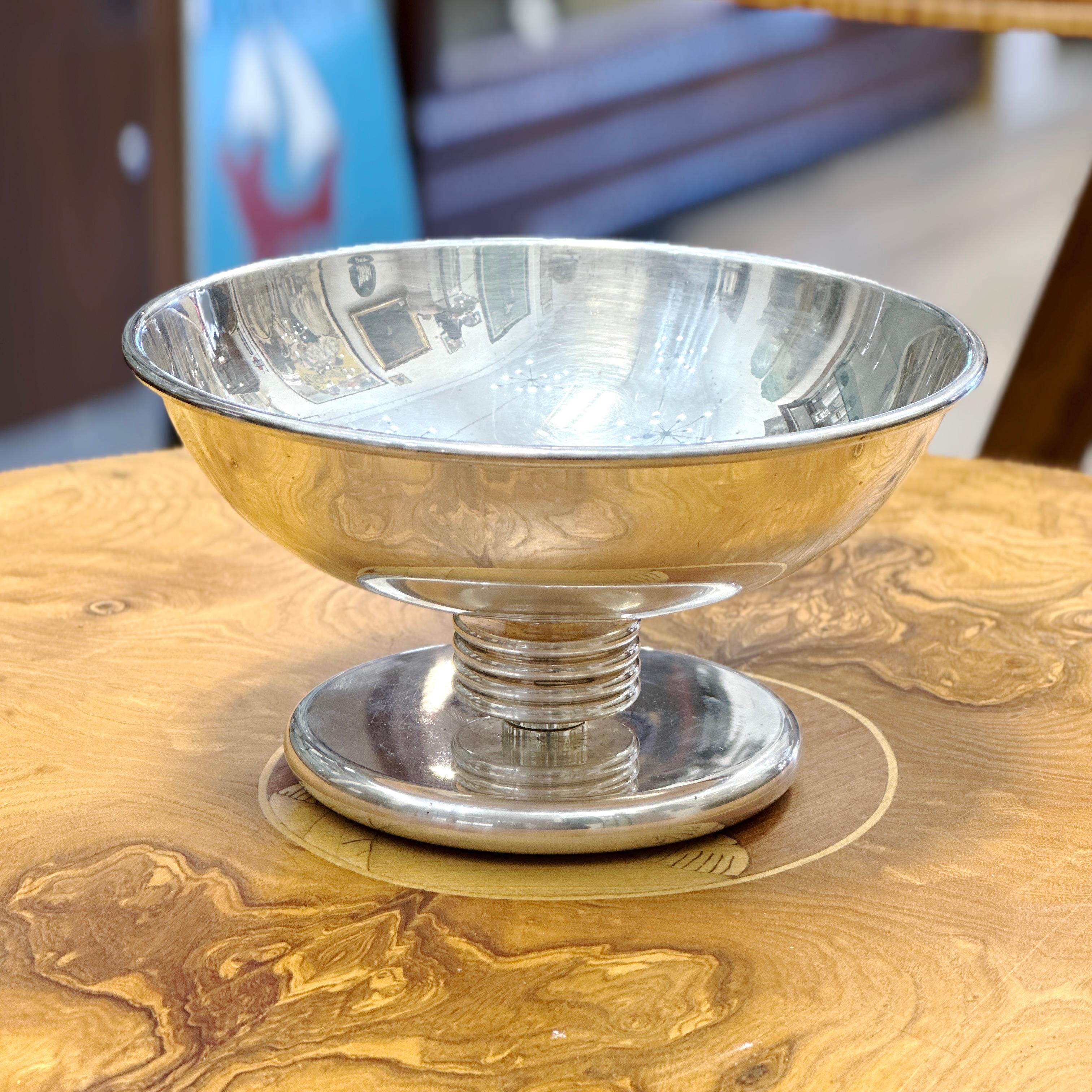 Here is a beautiful Vintage Christian Dior Silver Plated Pedestal Bowl. This lovely bowl features a deco style design and is stamped on the base with the makers mark. Made in France, circa approx. 1960s. Overall good condition for its age with wear