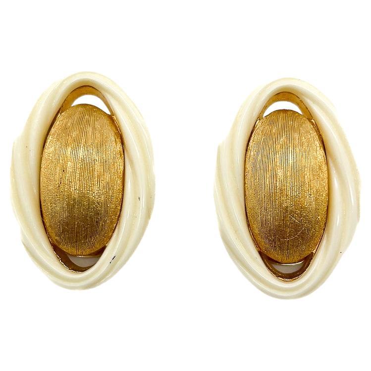 How do I wear Dior tribal earrings?