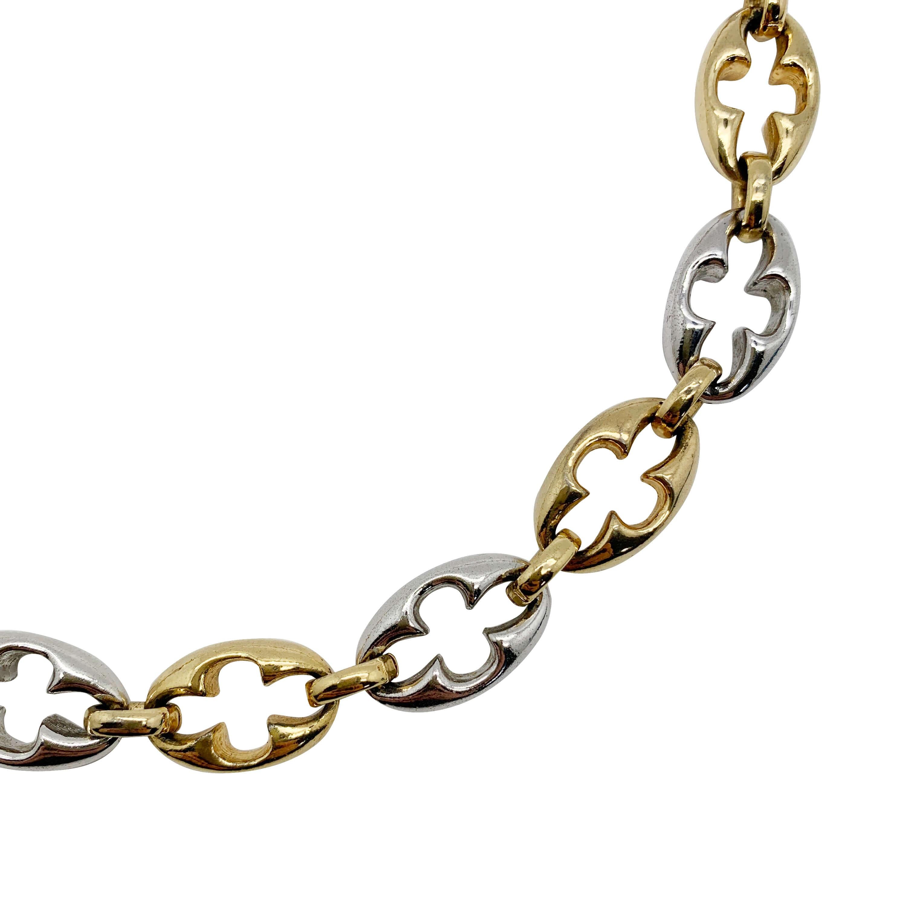 An exceptional Vintage Dior Talisman Necklace dating to 1975. The two tone metal link design inspired by the shape of a four leaf clover and intended to convey luck and protection. During particular periods the House of Dior signed a date on their