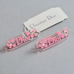 Par de horquillas vintage de Christian Dior del año 2000 con corazones rosas de lucita