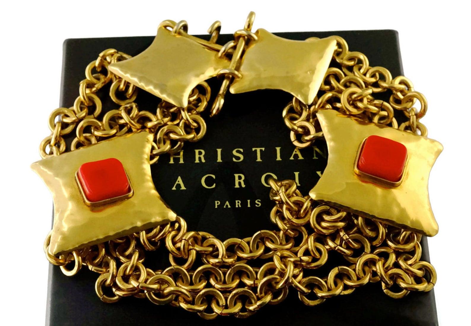 Vintage CHRISTIAN LACROIX Byzantine Cabochon Tiered Chain Plate Necklace

Measurements:
Height: 2 inches (square plates with cabochons)
Wearable Length: 19 inches

Features:
- 100% Authentic CHRISTIAN LACROIX.
- 3 layered chains.
- Square metal