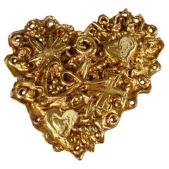 Broche vintage con el emblemático corazón del logotipo de Christian Lacroix