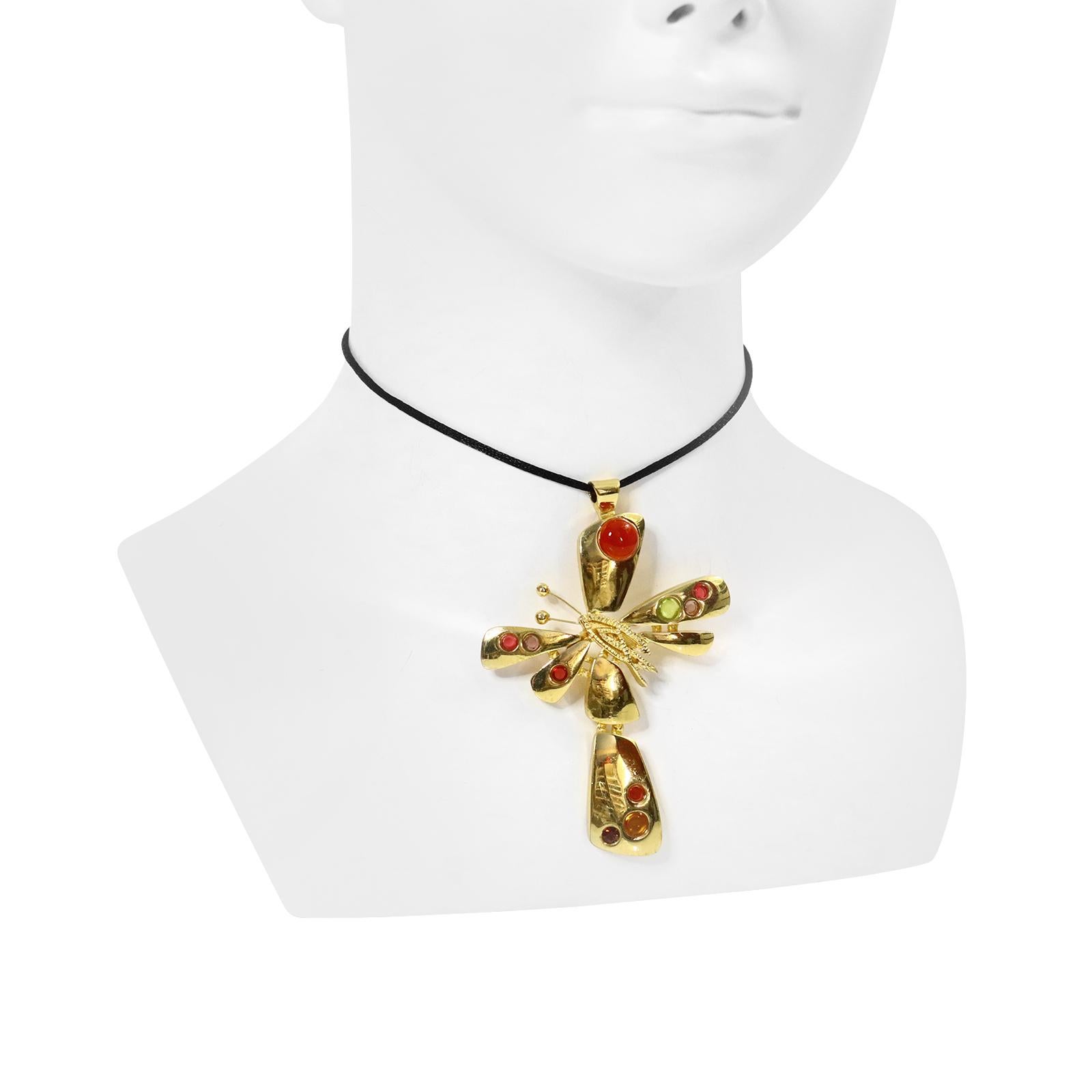 Vintage Christian Lacroix Paris Gold Cross with Cabochons Necklace. Has a Grasshopper in the Middle.  I have attached a black cord to this, but you can use any chain you have. The cord is 15 inches long. I have longer cords available. The cross is