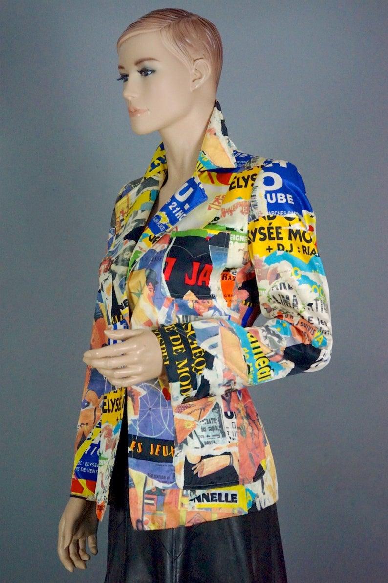 Vintage CHRISTIAN LACROIX Pop Art Collage Colourful Blazer Jacket

Measurements taken laid flat please double bust and waist:
Shoulder: 14.96 inches (38 cm)
Sleeves: 23.42 inches (59.5 cm)
Bust: 17.71 inches (45 cm)
Waist: 15.35 inches (39