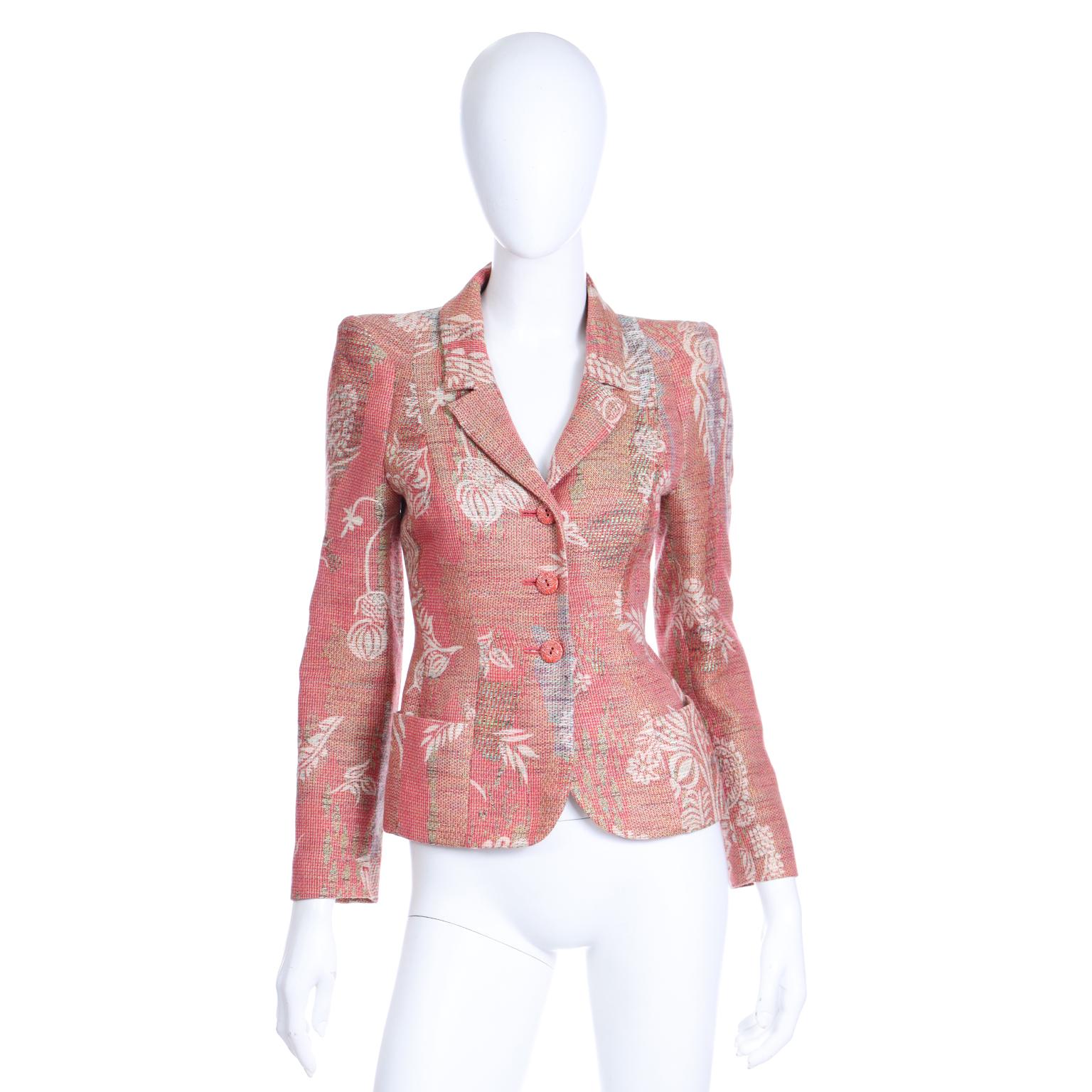 This gorgeous vintage Christian Lacroix jacquard blazer is in lovely shades of rose, green, blue and white. We love the fit of this jacket and the modern structure of the shoulders. There are two front pockets and three front buttons for closure.