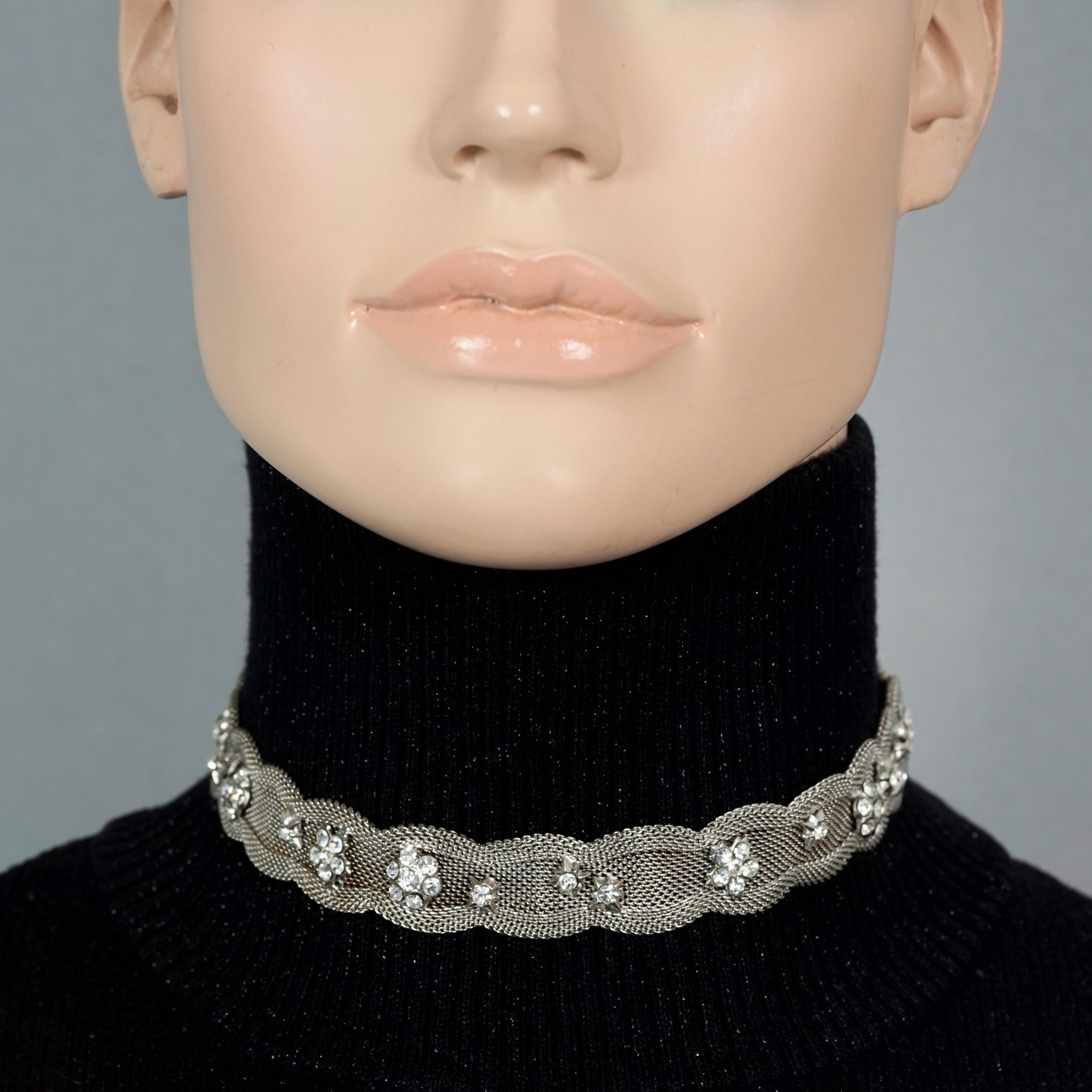 Vintage CHRISTIAN LACROIX Victorian Mesh Rhinestone Silver Choker Necklace

Measurements:
Height: 0.82 inches (2.1 cm)
Wearable Length: 13.50 inches (34.3 cm)

Features:
- 100% Authentic CHRISTIAN LACROIX.
- Delicate mesh choker embellished with