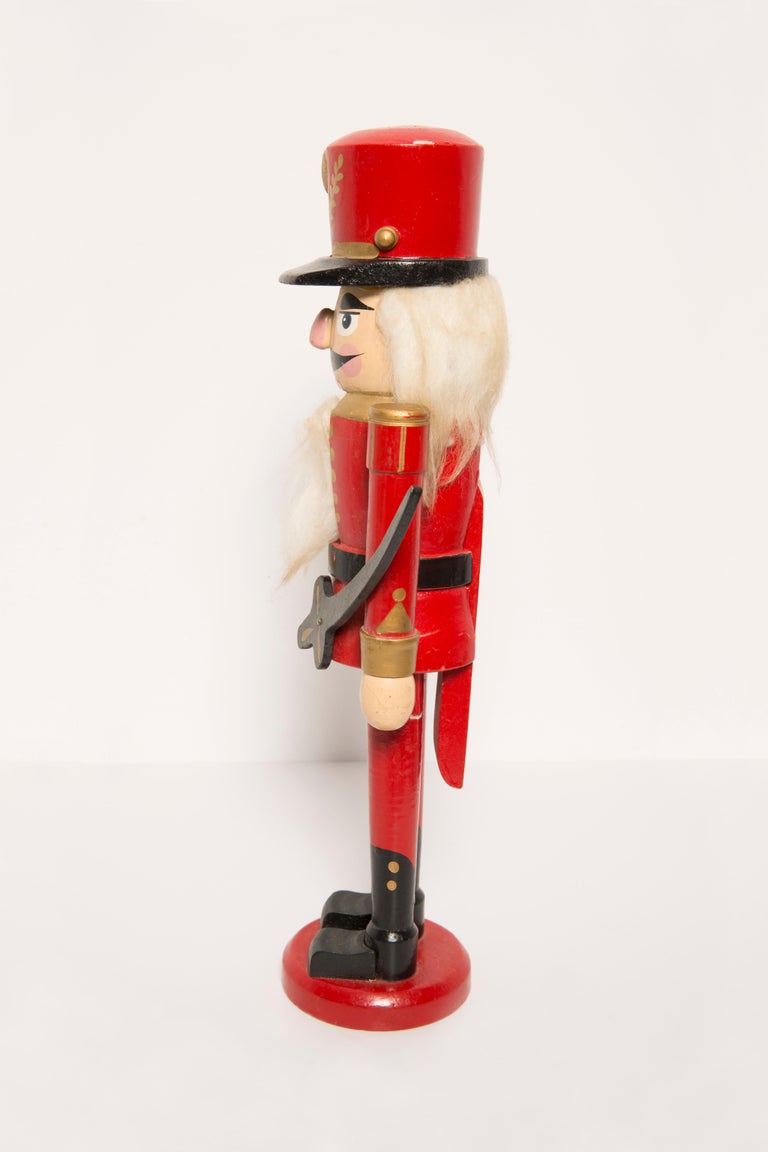 Hand-Painted Vintage Christmas Big Red Nutcracker with Knife, Wood, Erzgebirge, Germany, 1970 For Sale