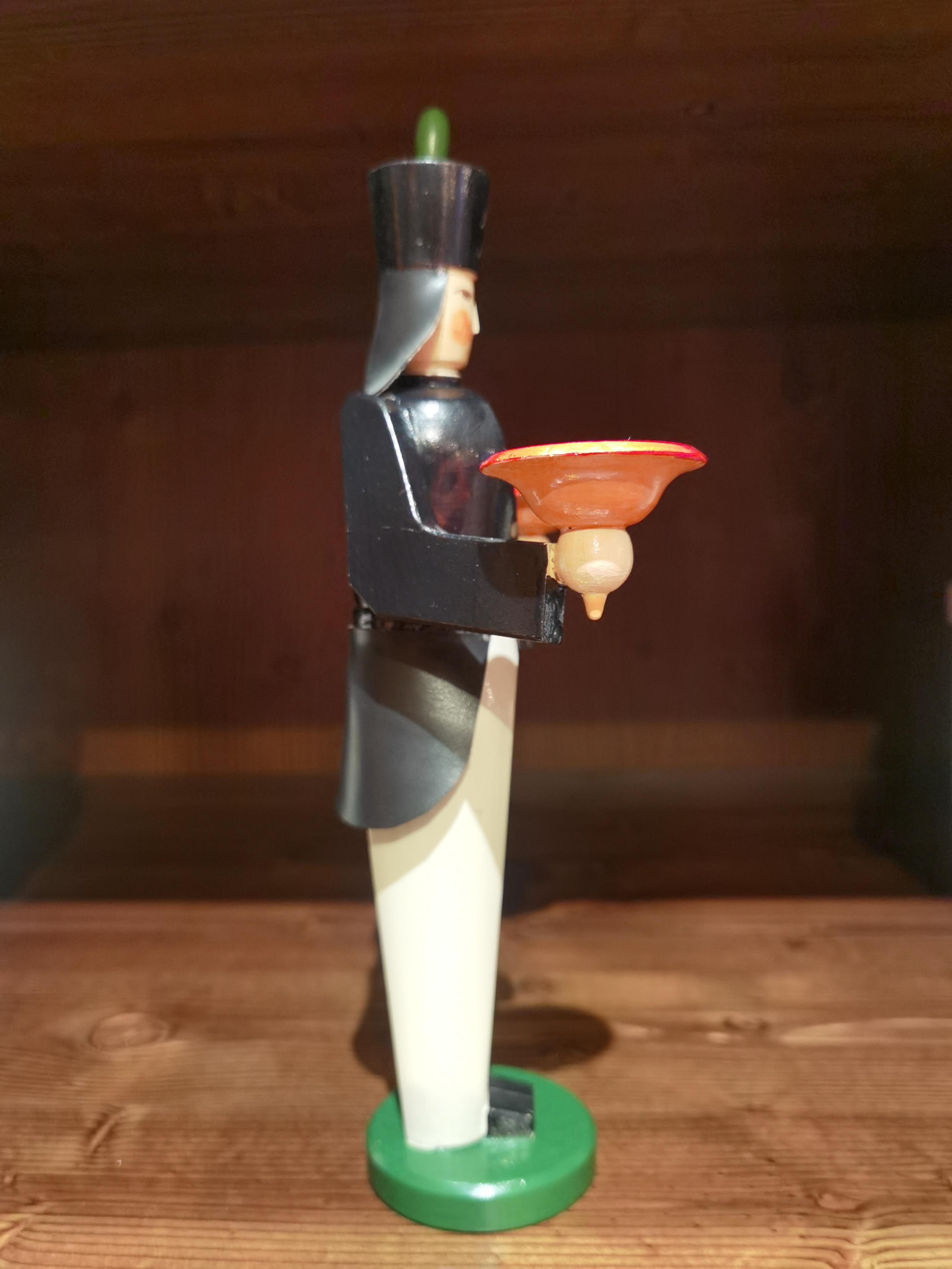 Vintage handmade and hand-painted candle holder in wood in the tradional art of the Erzgebirge. The handmade figures are produced in the area of the Erzgebirge in former Eastern Germany. Made for 2 candles. The region Erzgebirge formerly Eastern