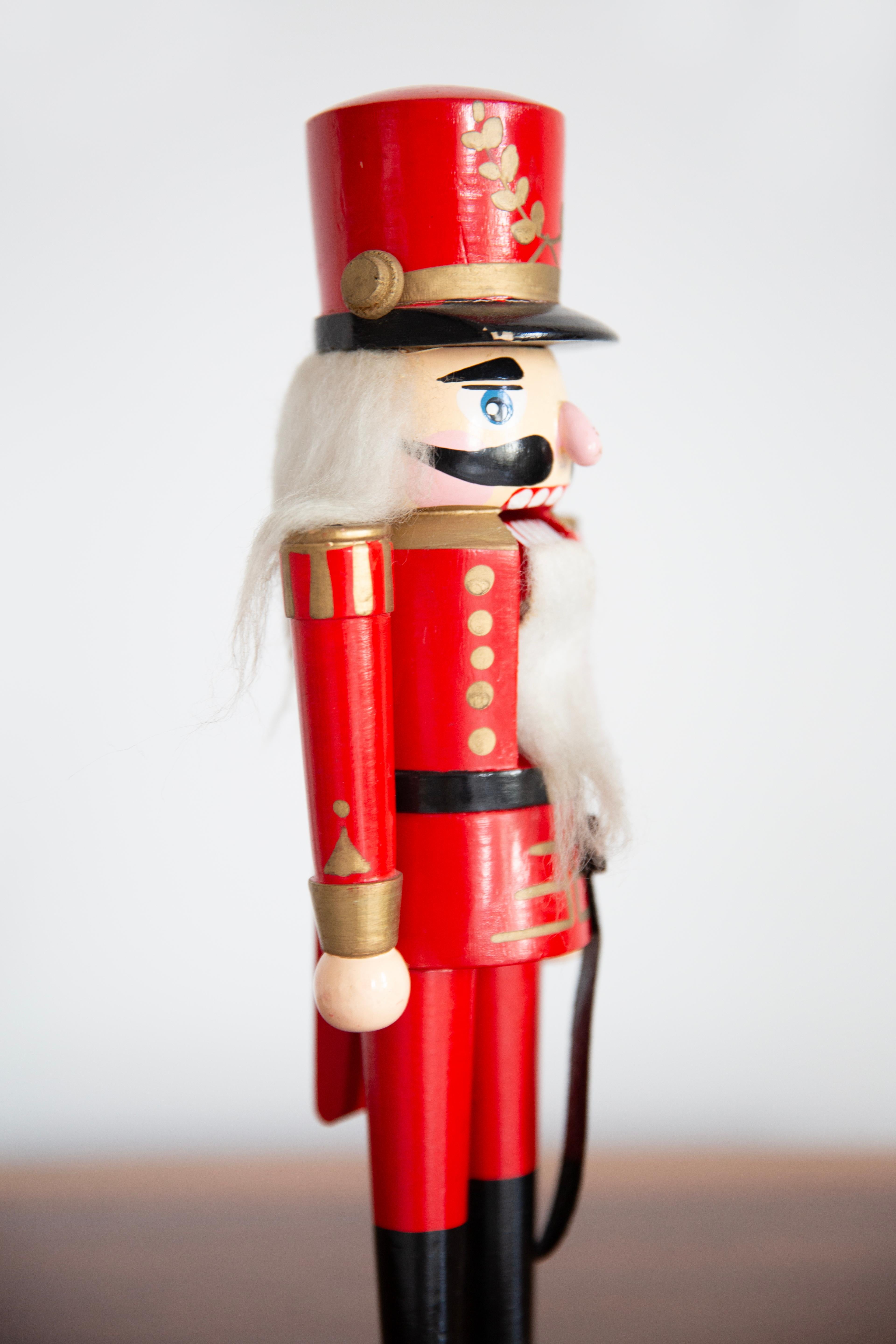 Hand-Painted Vintage Christmas Medium Red Nutcracker, Wood, Erzgebirge, Germany, 1970 For Sale