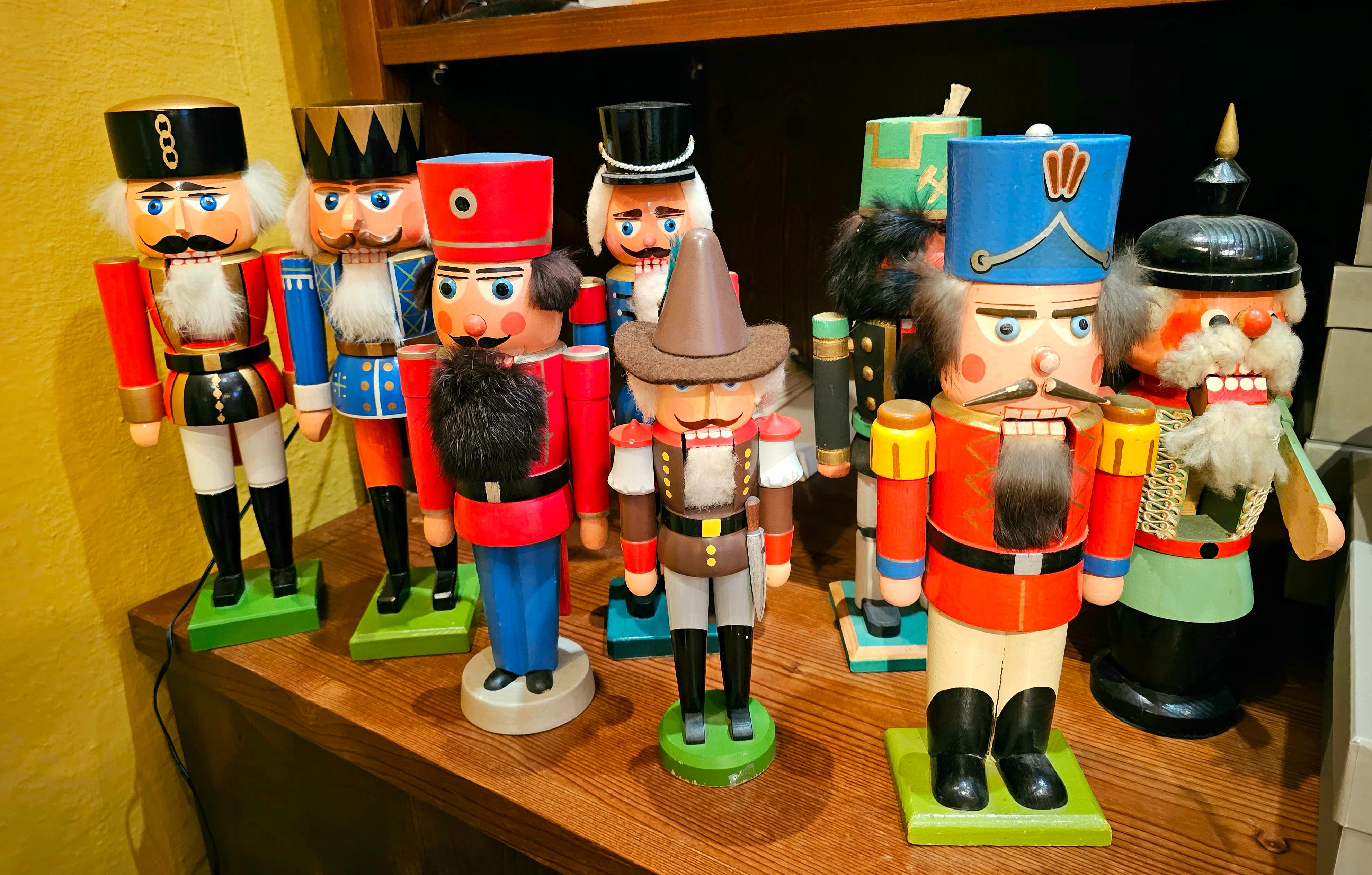 Folk Art vintage wooden nutcracker figure from the Erzgebirge. The region Erzgebirge formerly Eastern Germany is famous for this special kind of nutcrackers, where intricate carving has been their home. Completely hand-painted in red and blue colors