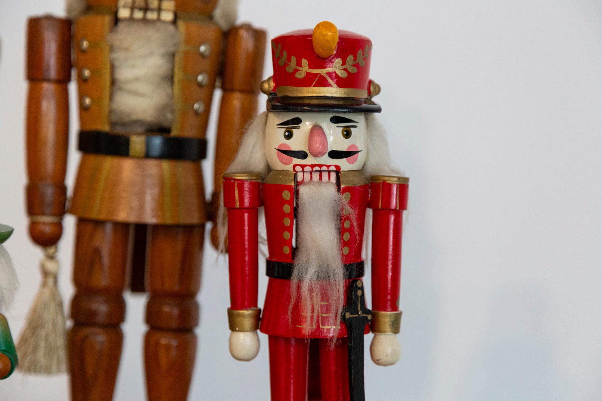 Wooden nutcracker figure from the Erzgebirge. The region Erzgebirge formerly Eastern Germany is famous for this special kind of nutcrackers, where intricate carving has been their home. Completely hand-painted in bright colors and decorated with