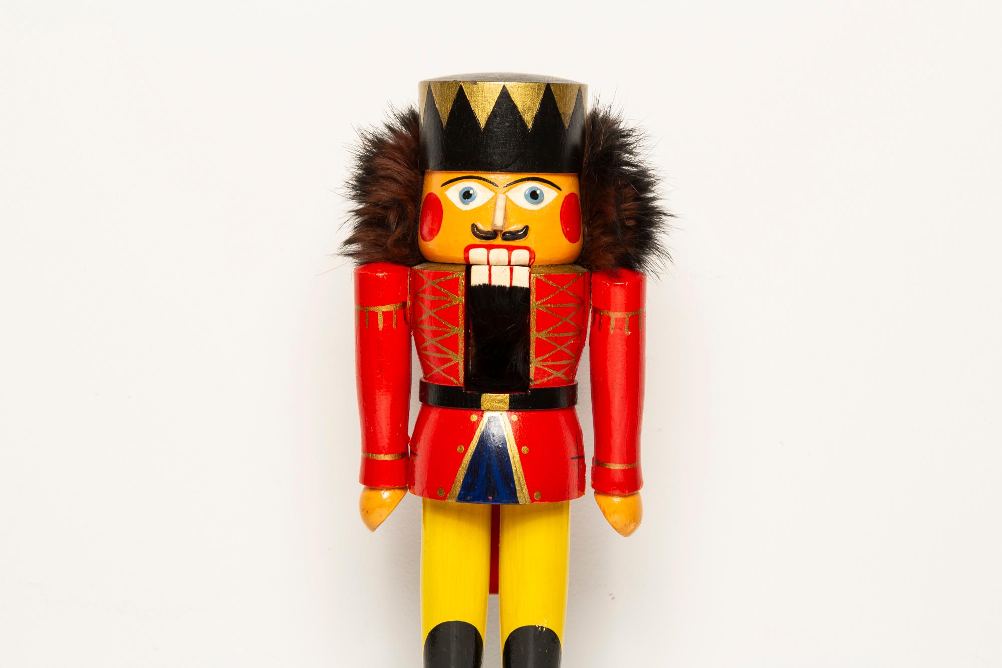 Hand-Painted Vintage Christmas Small Red Nutcracker, Wood, Erzgebirge, Germany, 1970 For Sale