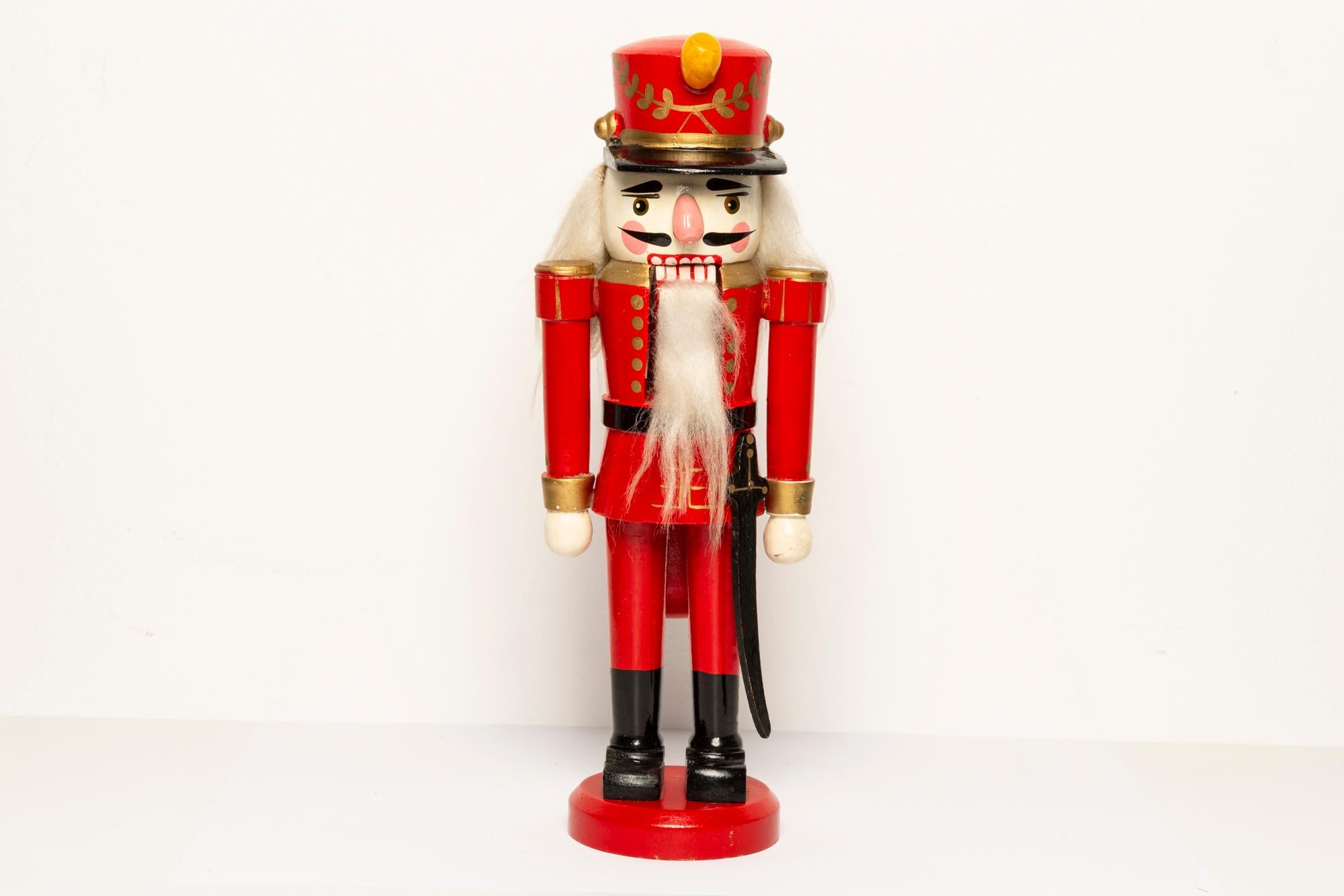 Hand-Painted Vintage Christmas Small Red Nutcracker, Wood, Erzgebirge, Germany, 1970 For Sale