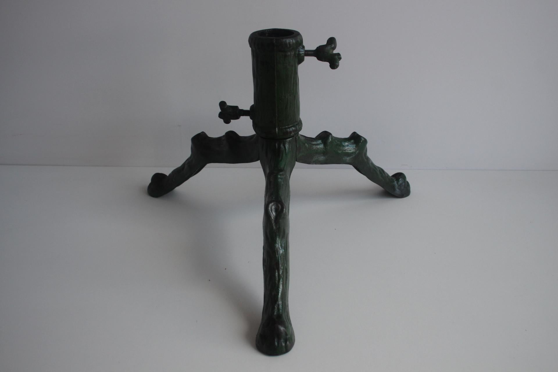 Massive and stable stand made of cast iron, metal. Decorated in the shape of a tree trunk with three removable legs.
The tree trunk is fastened with a screw from the side
Aging patina
Original Vintage Condition