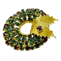 Vintage Christmas wreath gold tone greed red rhinestone designer brooch