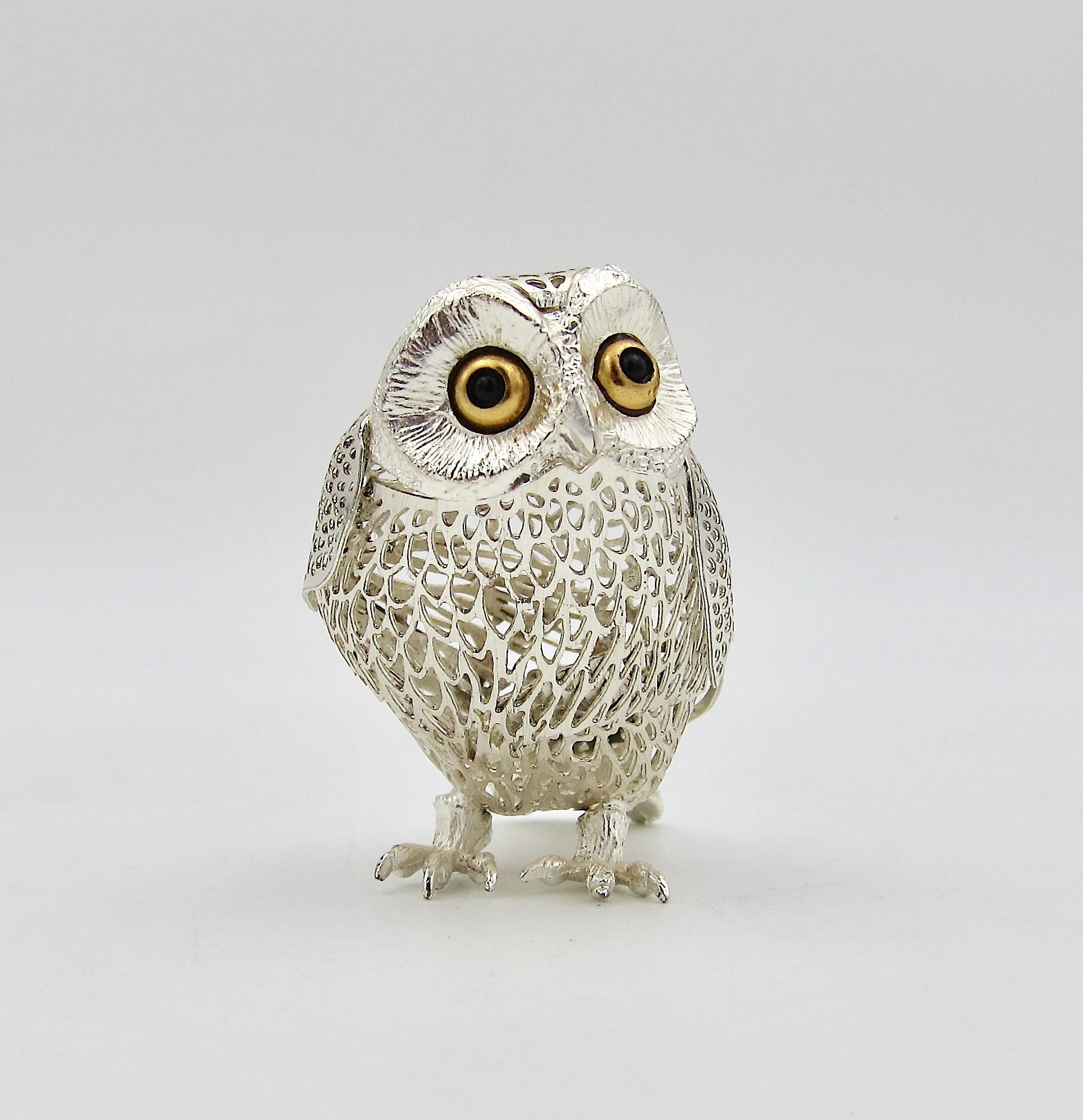 A silver-plated vintage owl figurine from the Christofle of Paris Collection Lumière d'Argent (Silver Light Collection). Le Grand Hibou (The Great Owl) has a delicate and lacey openwork silver metal body with textured feathers, gold tone eyes and
