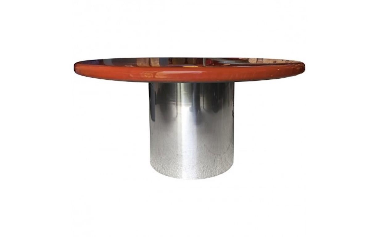 Vintage chrome and lacquer cocktail table, 1970s. Polished chrome pedestal base with top in 'Opium Red' lacquer over wood.Vintage chrome and lacquer cocktail table, 1970s. Polished chrome pedestal base with top in 'Opium Red' lacquer over wood.

 