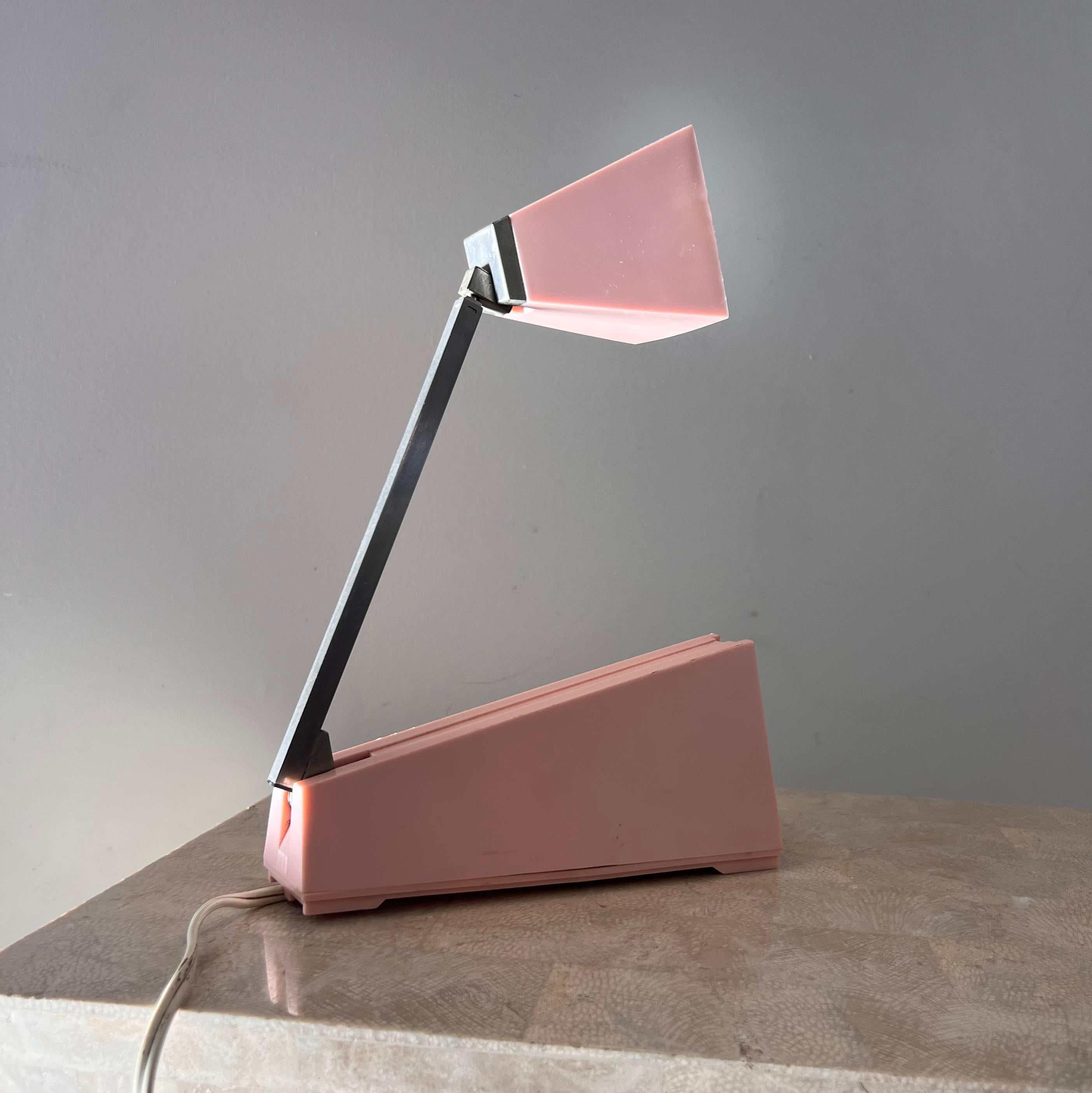 A space age “Lampette” task lamp in chrome and pastel pink by Koch Creations, Japan 1964. Neck collapses into body when summoned. Chord reads “yazaki 1965”. Pick up in central west Los Angeles or we ship worldwide.

When collapsed: 10” W x 2.75” D x