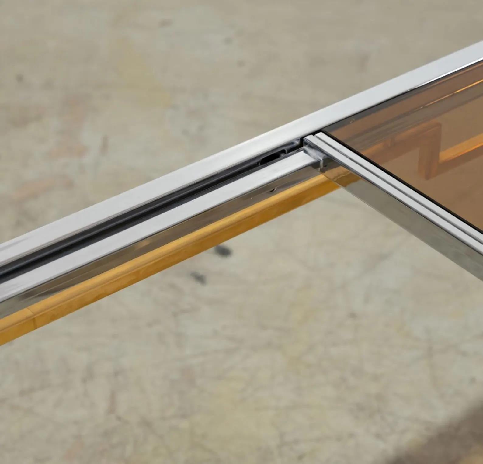 Fin du 20e siècle Vintage Chrome, Brass & Smoked Glass Expandable Dining Table In Style of DIA en vente