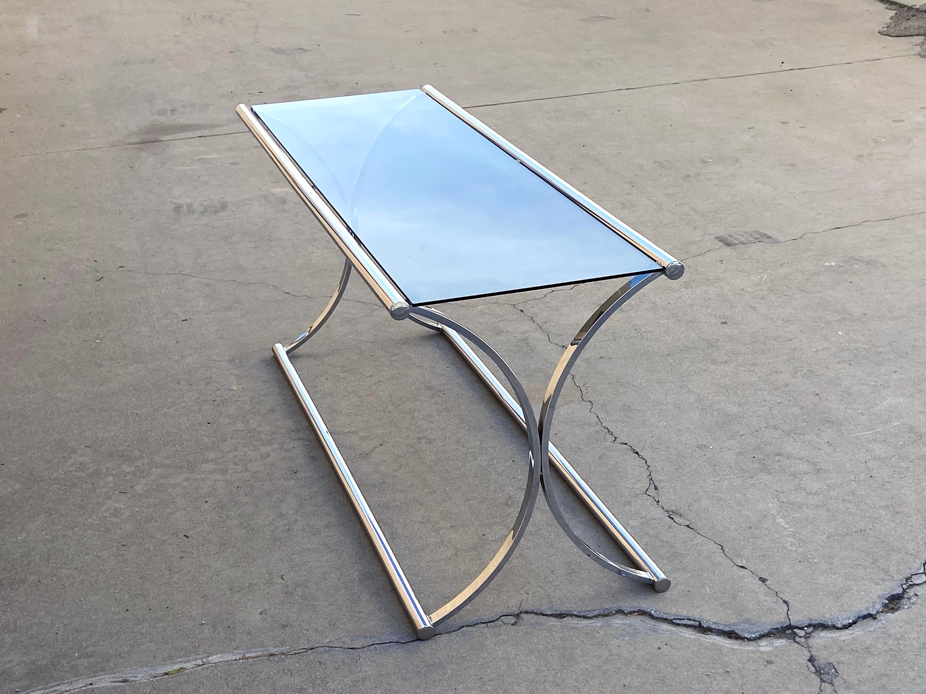 Vintage chrome console table circa 1980s with new smoked glass top. Sleek modern half moon base is in original condition, chrome finish looks great for age with only minor spotting as pictured. Perfect sized table for an entryway or