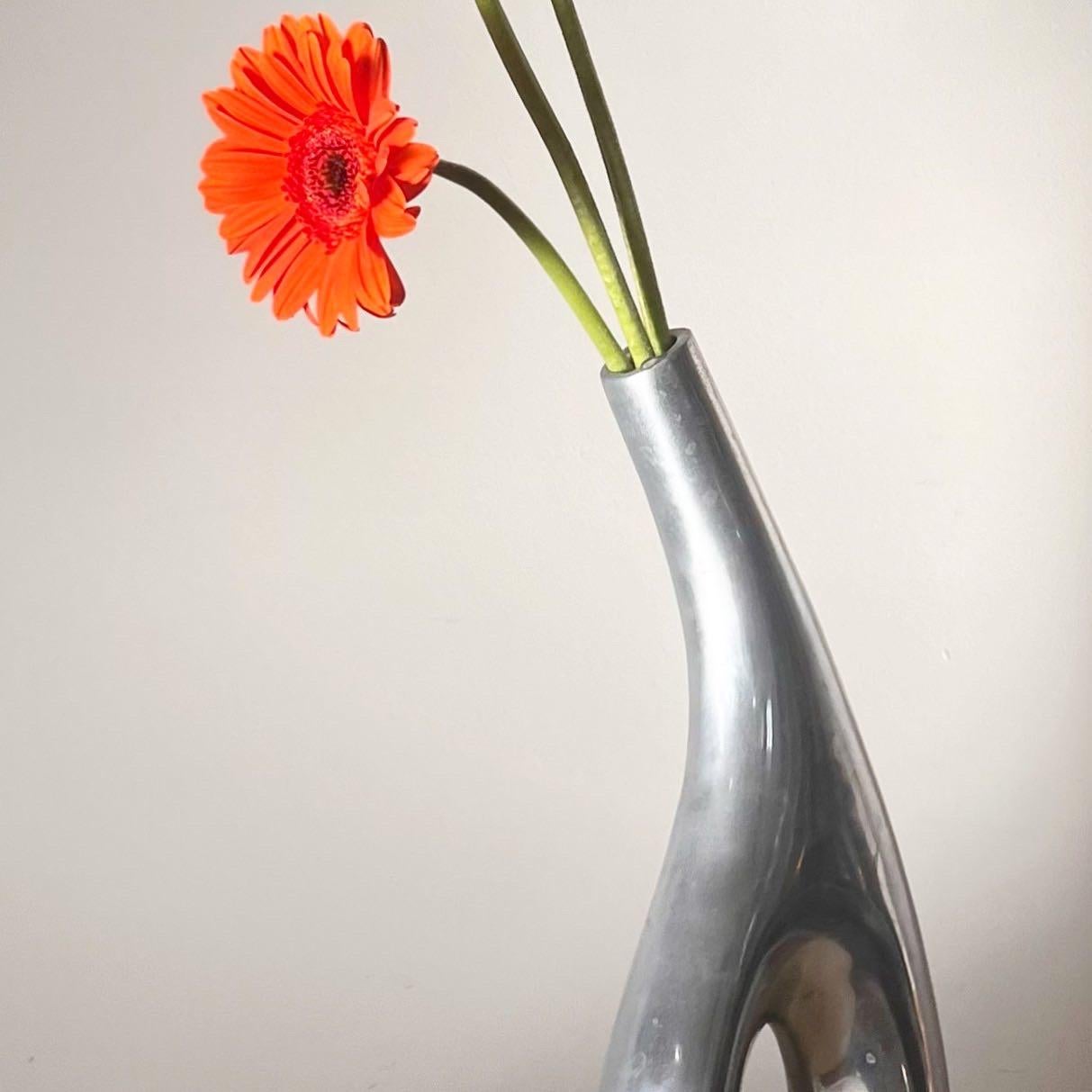 GO PLATINUM: a chrome cut-out vase, 20th century. Pick up in LA or we ship worldwide. 
5” W x 3” D x 15” H
