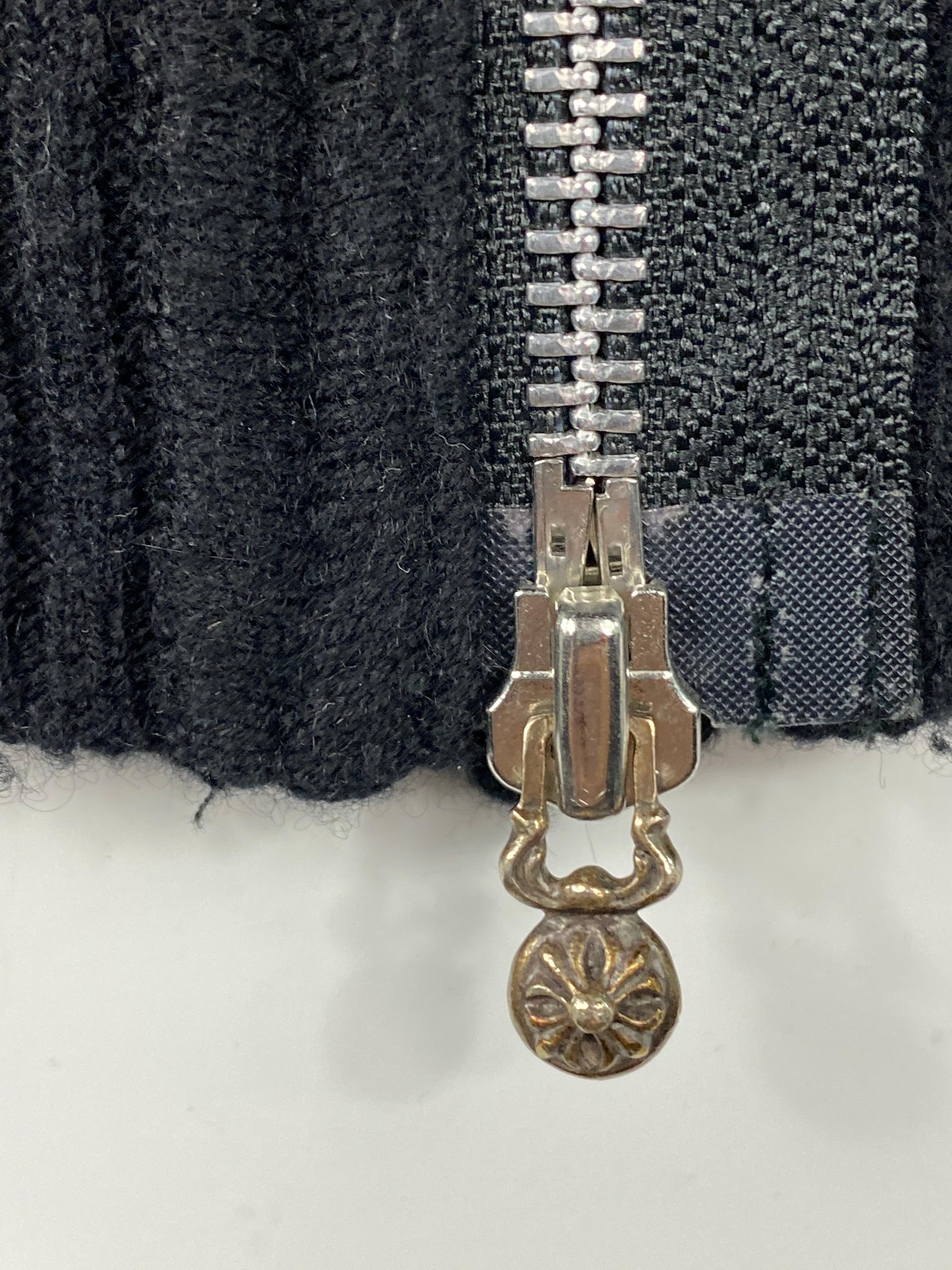 Product details:

Featuring 100% cashmere blazer sweater with front silver tone zip closure and v neck line designed by Chrome Hearts in U.S.A. 