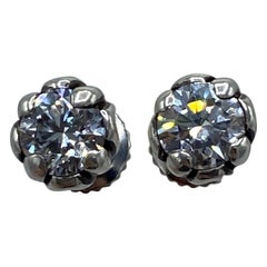 Louis Vuitton Diamond Gold Stud Earrings at 1stDibs