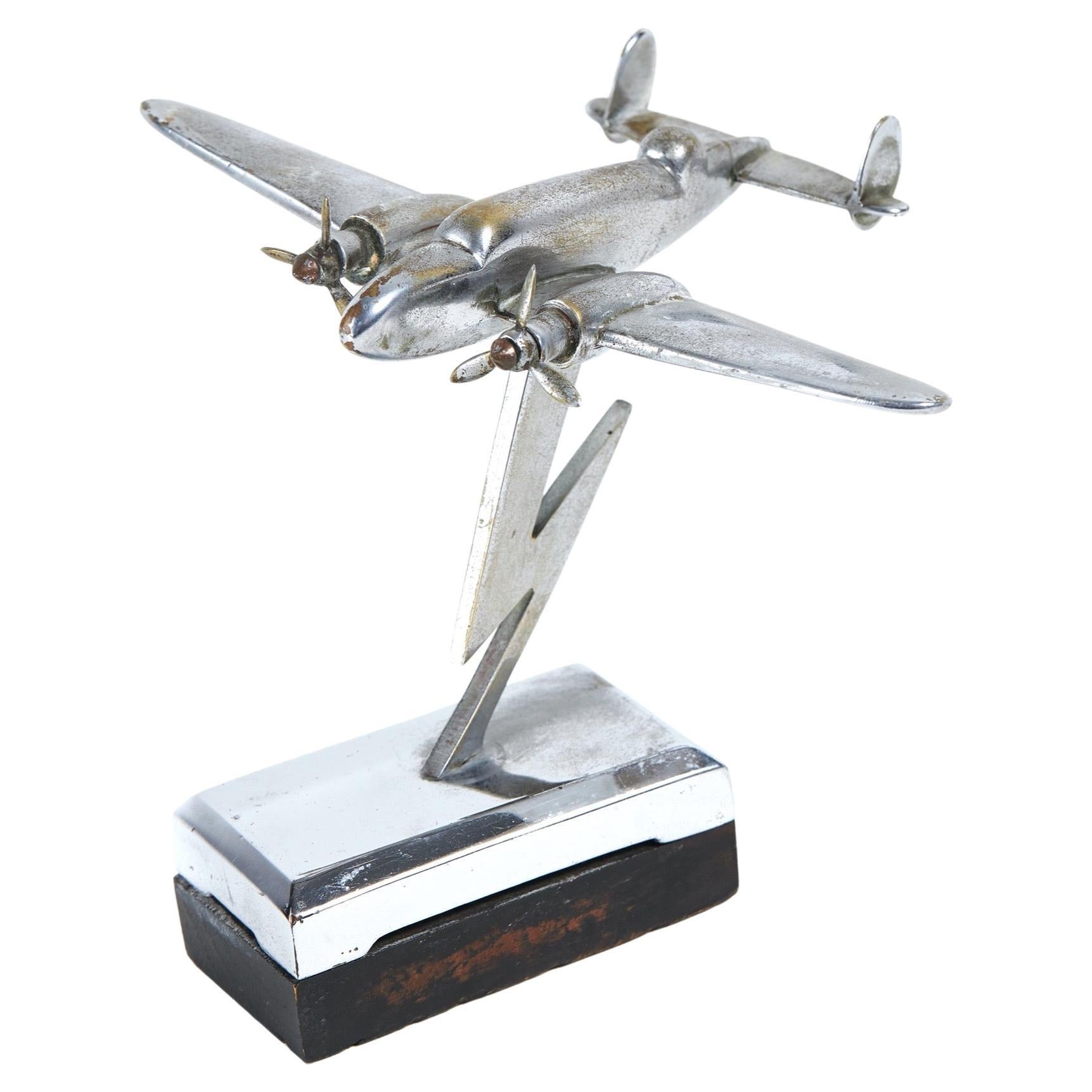 vintage Chrome model of WW11 Bomber Airplane on stand 
