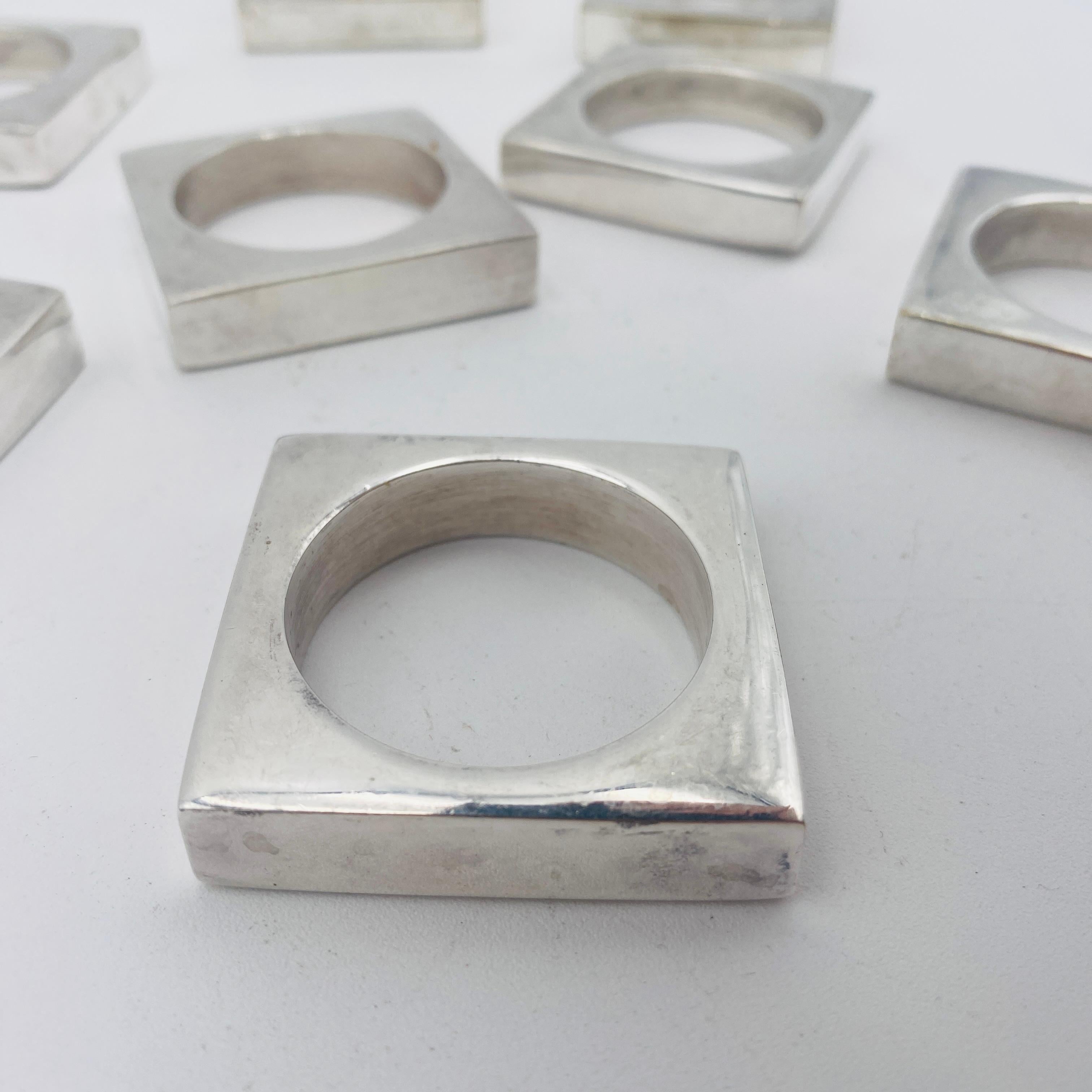 A set of 8 vintage chrome napkin rings. 