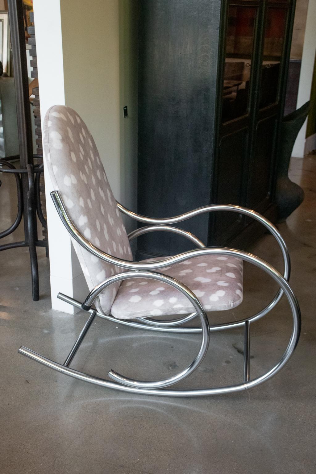 Vintage chrome rocking chair gets fresh look with cozy soft, fawn-spotted upholstery. Upholstery is new. 
 Chrome frame is shaped in the style of a bentwood rocker.