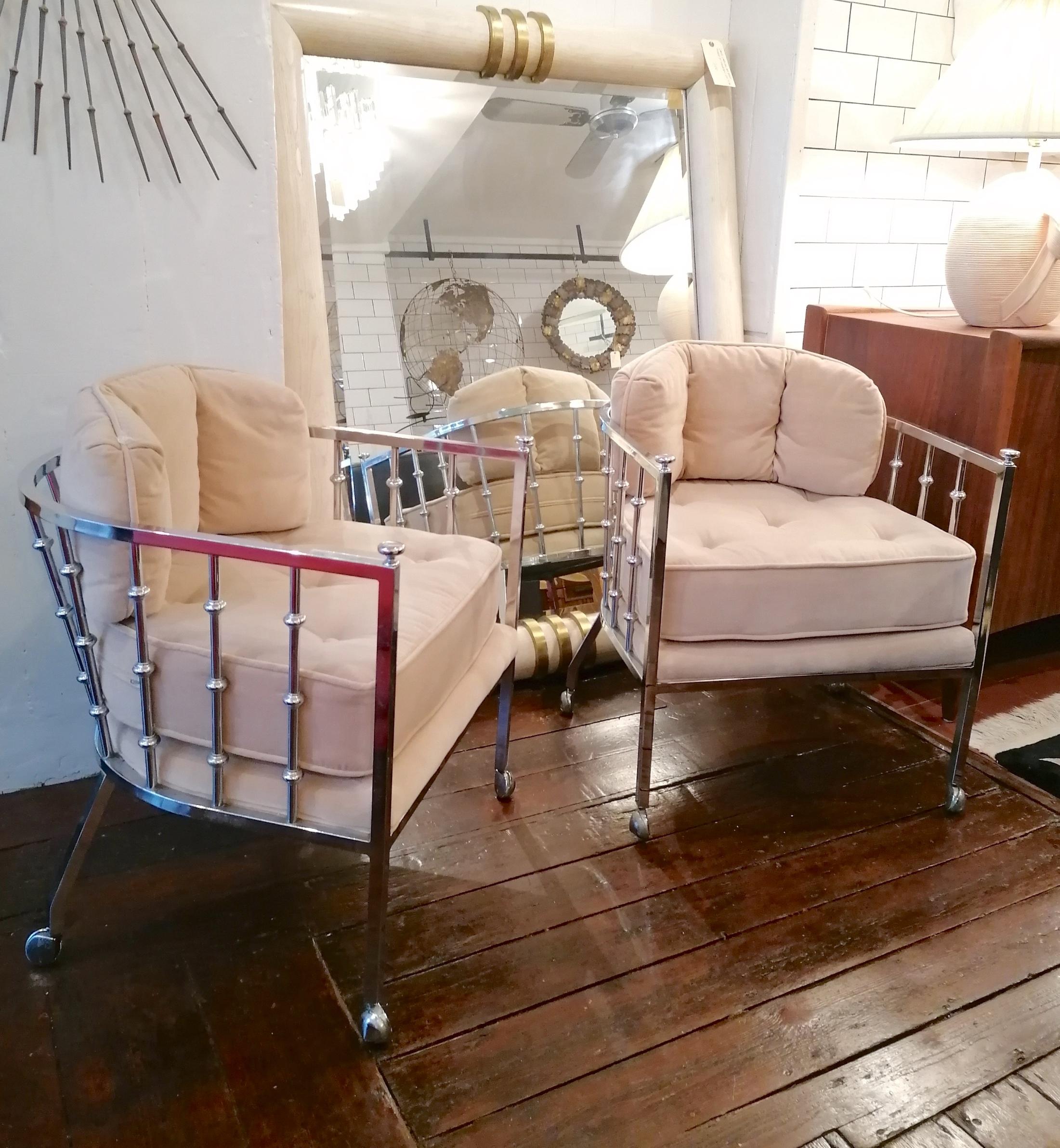Unusual chrome spindle armchairs with casters, by Drexel, USA, 1970s: two available.
The original velvet upholstery is a very subtle blush colour. Newly re-webbed. Selling chairs individually separately.

Dimensions: width 61cm, depth 64cm, height