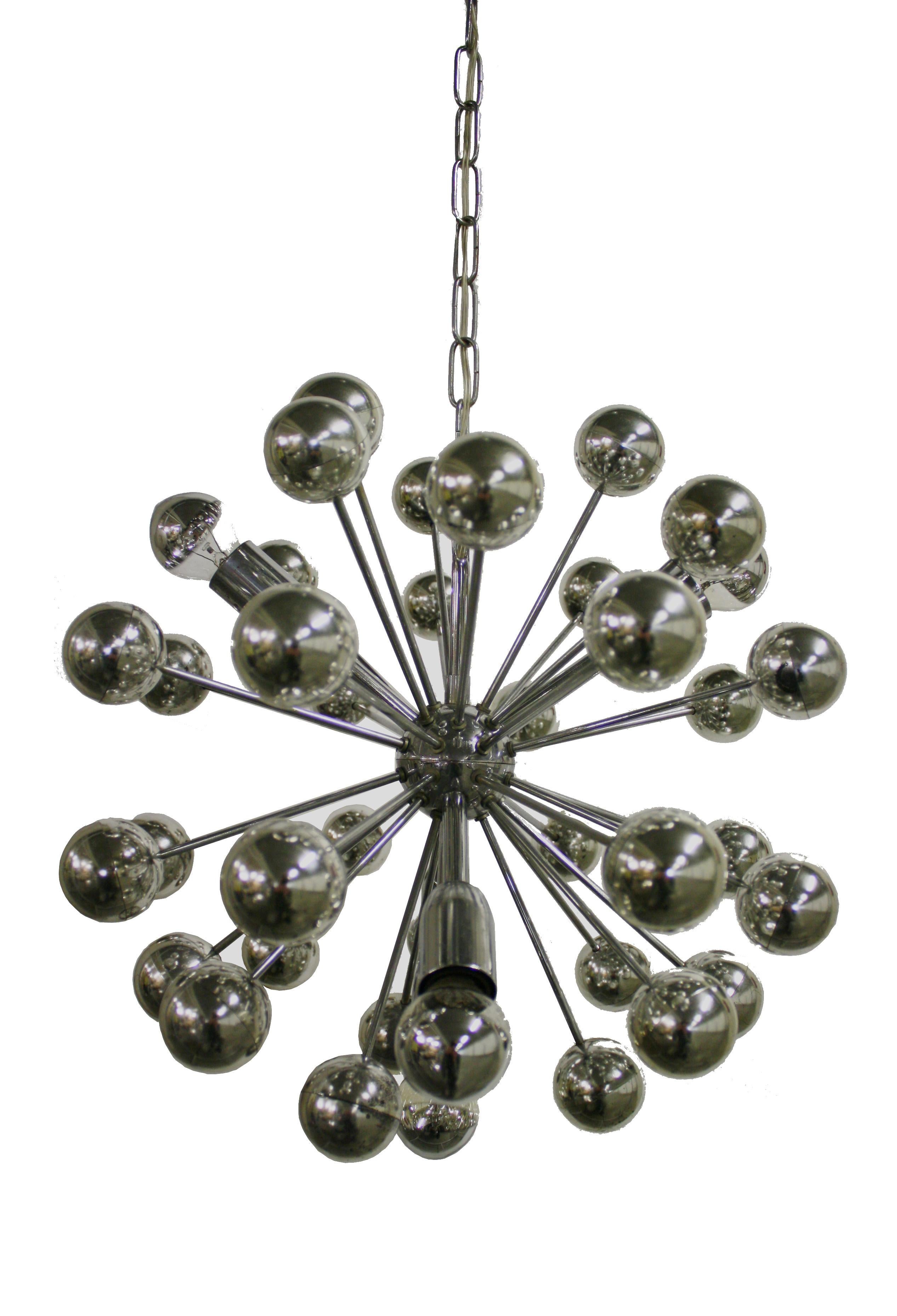 Sputnik chandelier with chromed metal sockets, arms and body interspersed with chrome plated plastic spheres.

The chandelier creates a beautiful effect.

Tested and ready for use. To be used with regular E14 light bulbs.

The chandelier is in