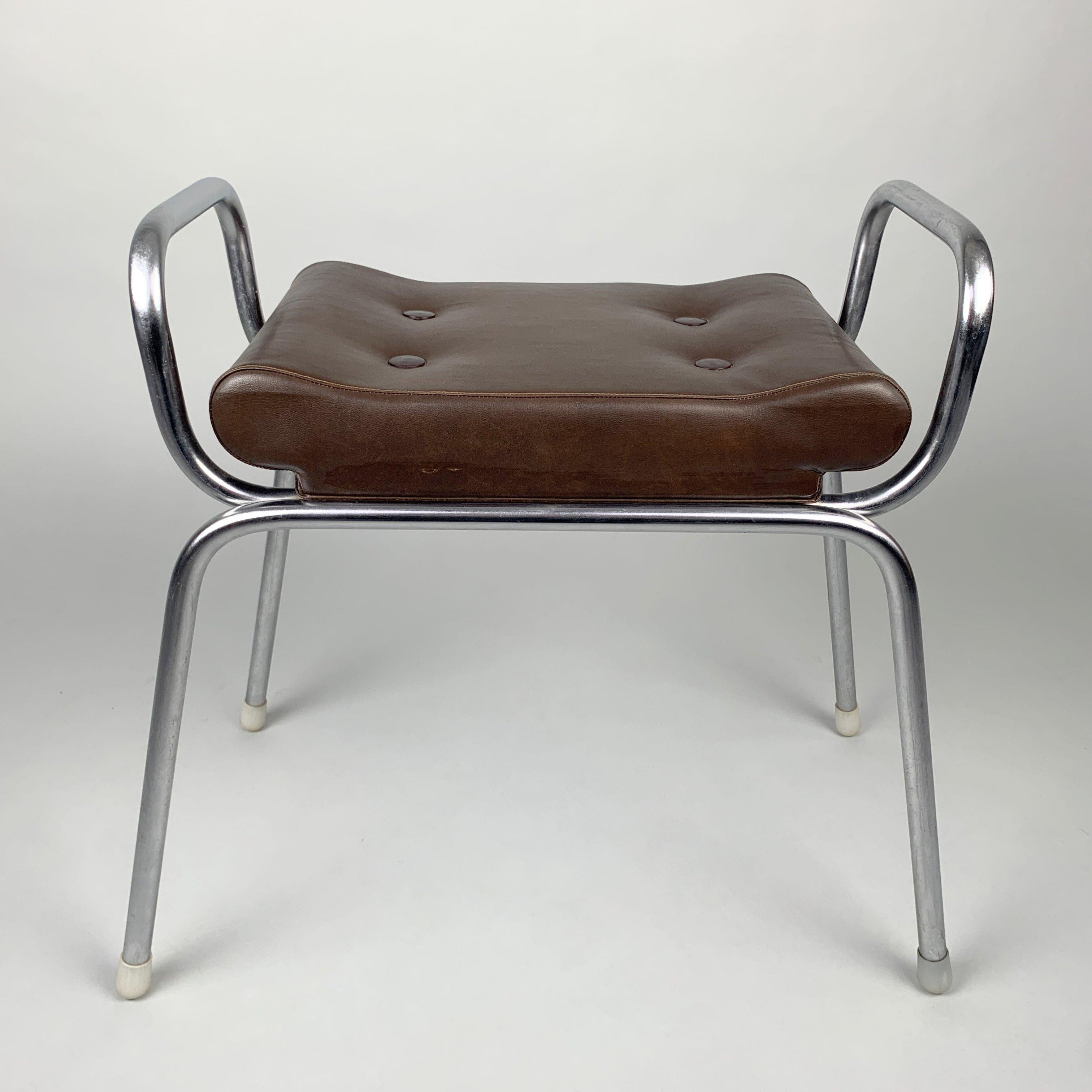 Beautiful vintage chrome and artificial leather stool from former Czechoslovakia. Overall the chair is in very good condition, except for a small defect in the upholstery (see photo).