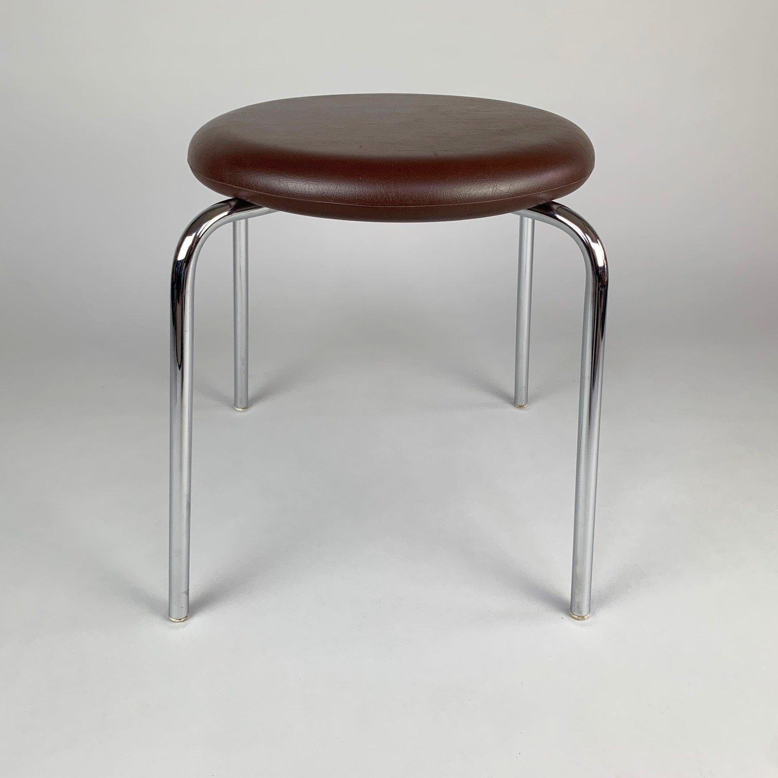 Vintage chrome and artificial leather stool from former Czechoslovakia. Some signs of use on the leatherette, see photo.