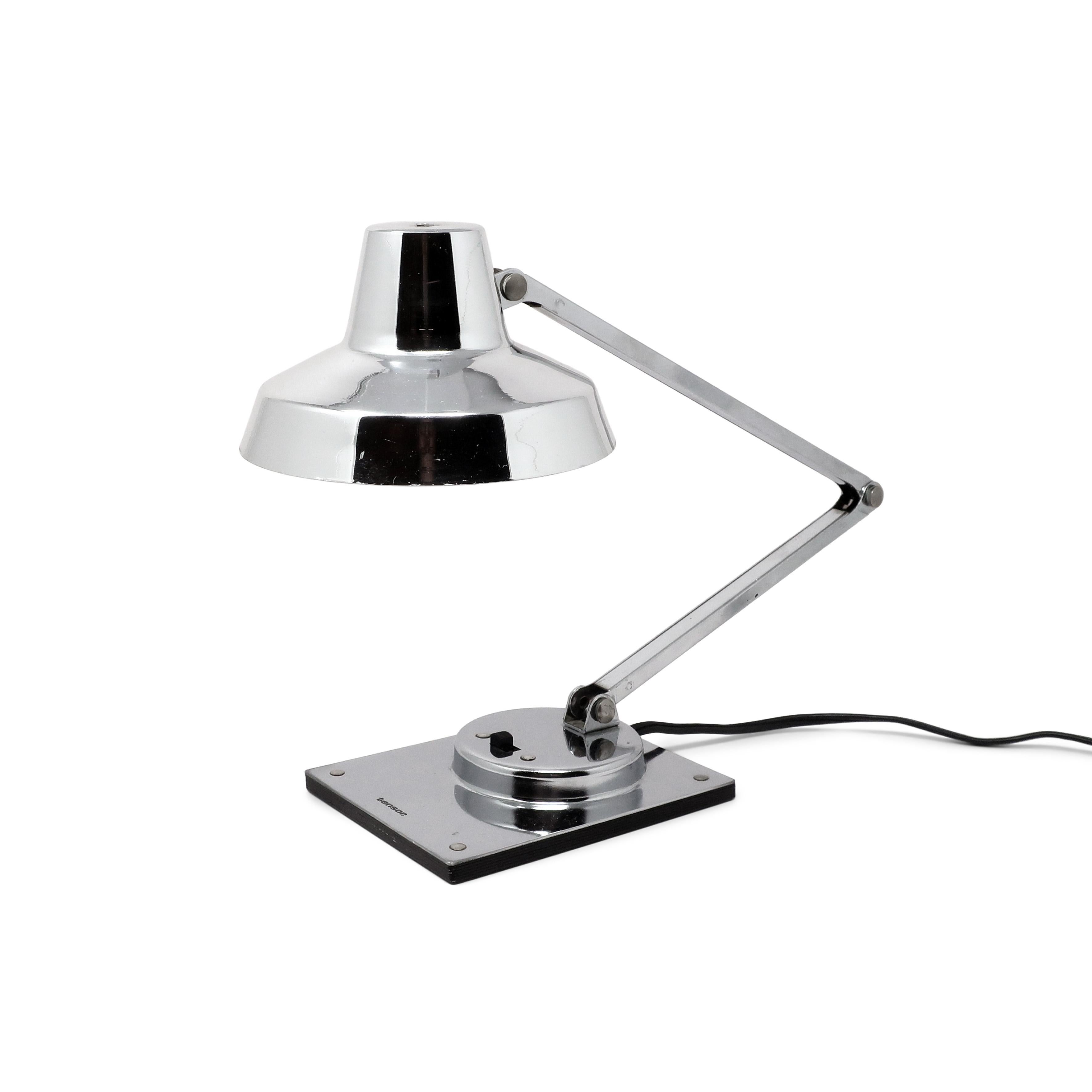 A perfect mid-century modern Tensor articulating desk lamp with a chrome shade, chrome stem, and chrome base with on/off switch.  In very good vintage condition.

4
