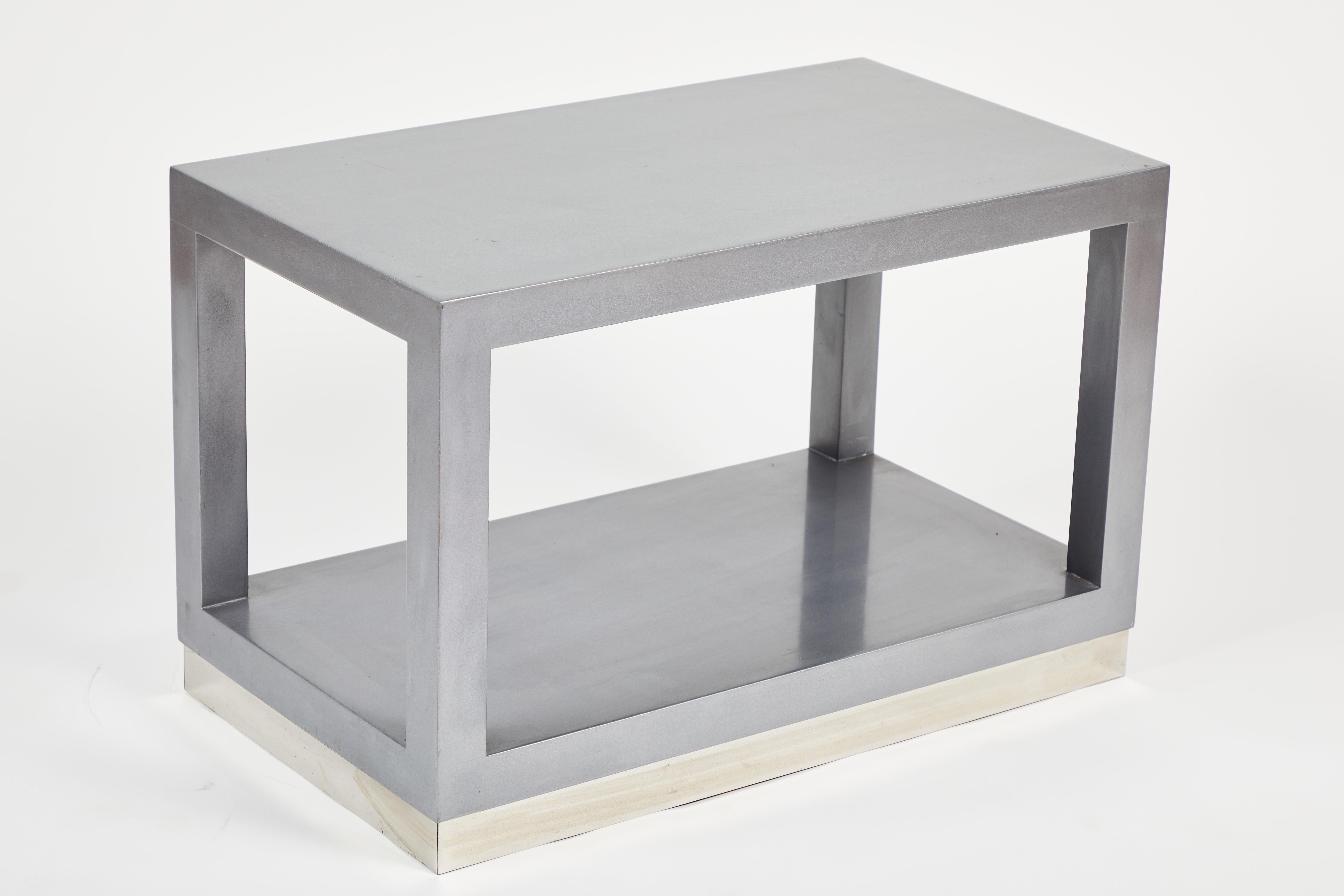 Exceptional side table in the style of Karl Springer with Parsons-style frame, chromed steel base, and enameled wood frame. Minor imperfections to finish, scratches at table underside.