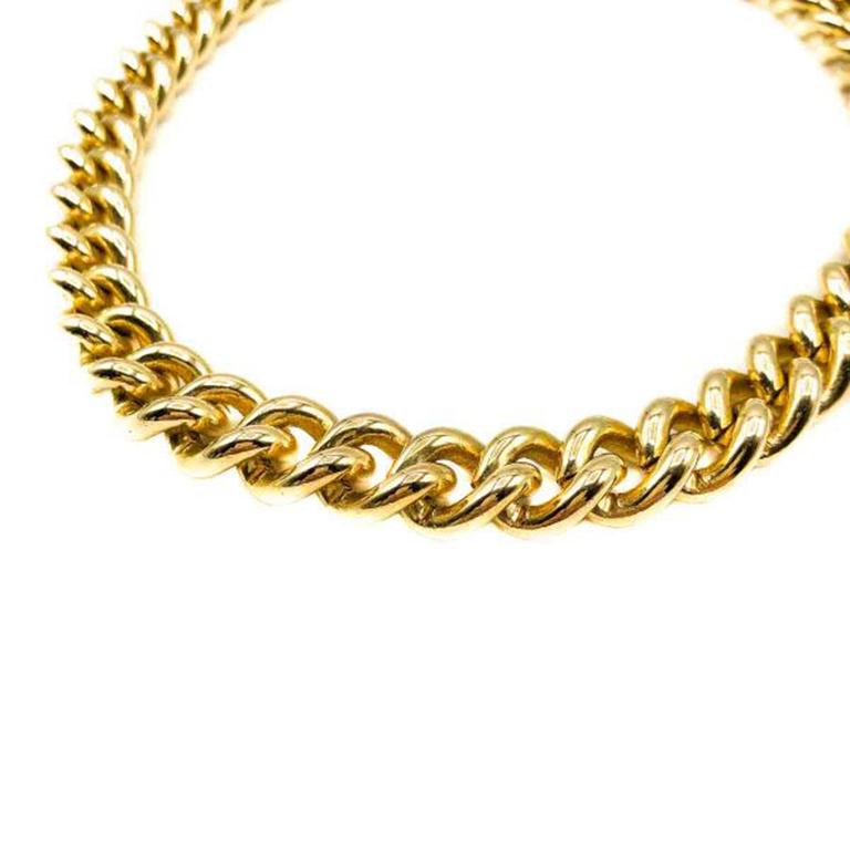 A fabulous Vintage Gold Curb Chain necklace. Crafted in weighty gold plated metal with solid links. In very good vintage condition, 43cms. A wonderfully chic and edgy find. Should you choose to buy from us, we commit to the item being as described.