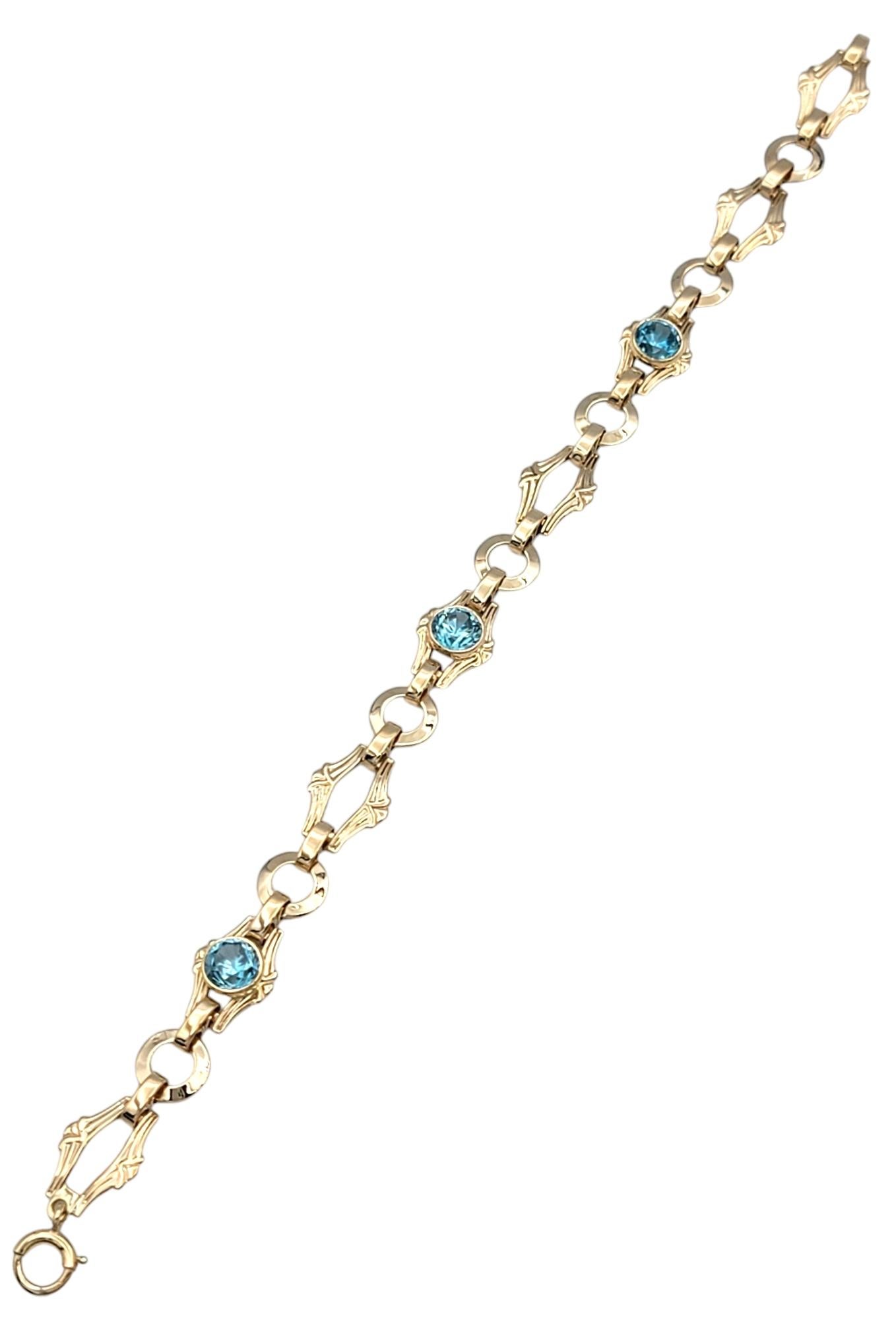 Contemporary Vintage Church & Company Round Cut Blue Zircon Ornate Rose Gold Link Bracelet For Sale