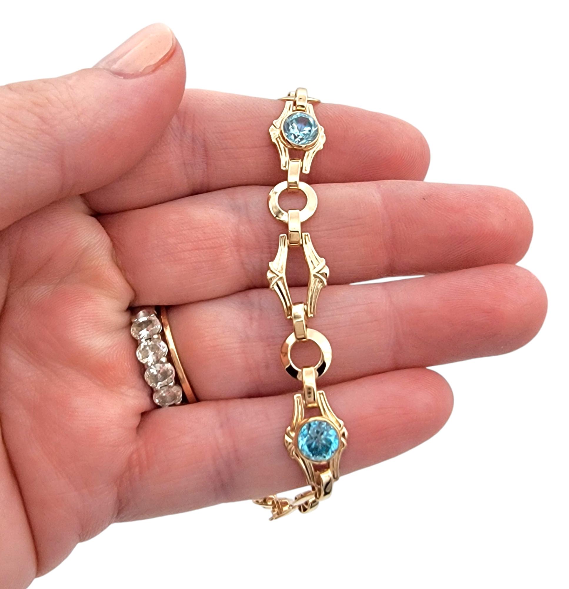 Vintage Church & Company Round Cut Blue Zircon Ornate Rose Gold Link Bracelet For Sale 1