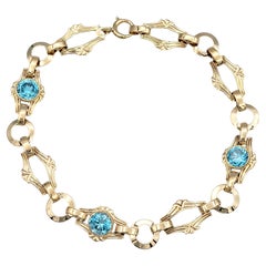 Vintage Church's & Company Bracciale a maglie in oro rosa ornato con zircone blu taglio rotondo