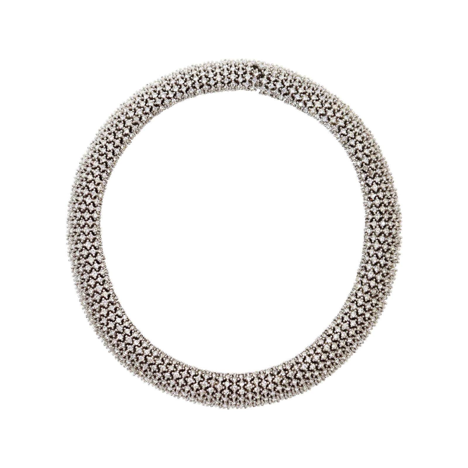 Vintage Ciner Silver Tone Diamante Rounded Choker Necklace Circa 1980s. No more need be said about this beauty.  It is a classic that has been made throughout the centuries.  Always in style.

Ciner is no longer in business so this is now a