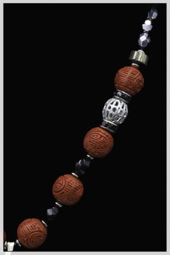 Vintage cinnabar pendant , cinnabar beads, and sterling comprise this unique pie