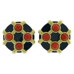 Orecchini Cipullo vintage in oro 18k con corallo e onice nera 1972