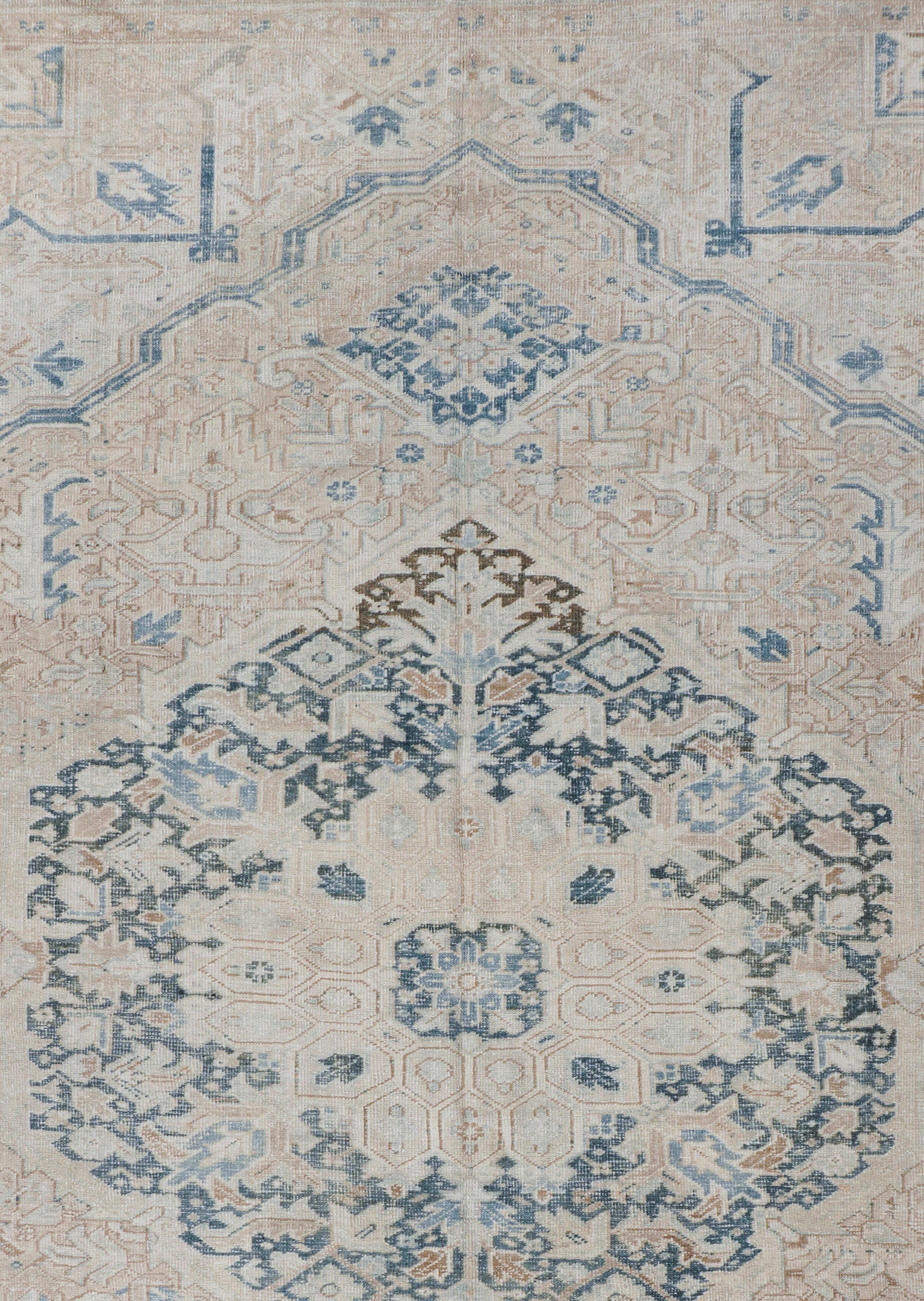 Vintage Circa 1930 Beige Persian Distressed Heriz Hand Woven Wool Rug, 9'4 X 13'8. Distressed, Shabby Chic. The rug is solid but with low pile and a distressed look that adds to its beauty and charm. The rug has a solid foundation and will stand up