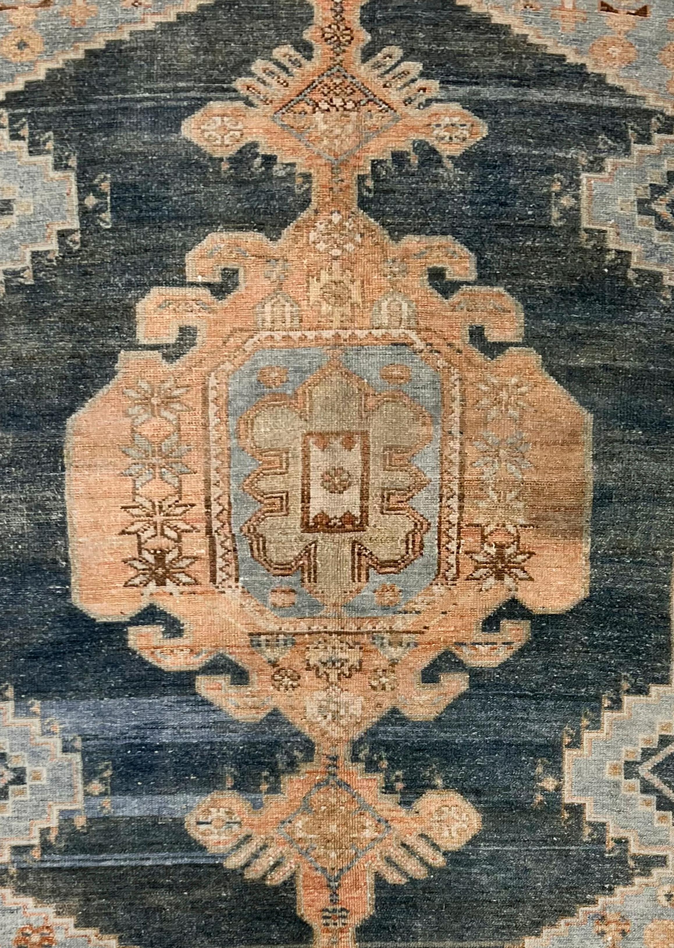 4'3 X 7'6. Rugs from Malayer, east of Hamadan, could be considered top quality Hamadan’s and they share similar structural aspects. The wonderful soft pastel blues of the border contrast so well with the darker main field to create this very