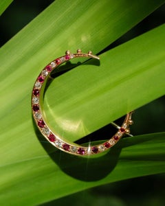 Vintage Circa 1930s Ruby & Diamond Crescent Brooch 18 Carat Yellow Gold