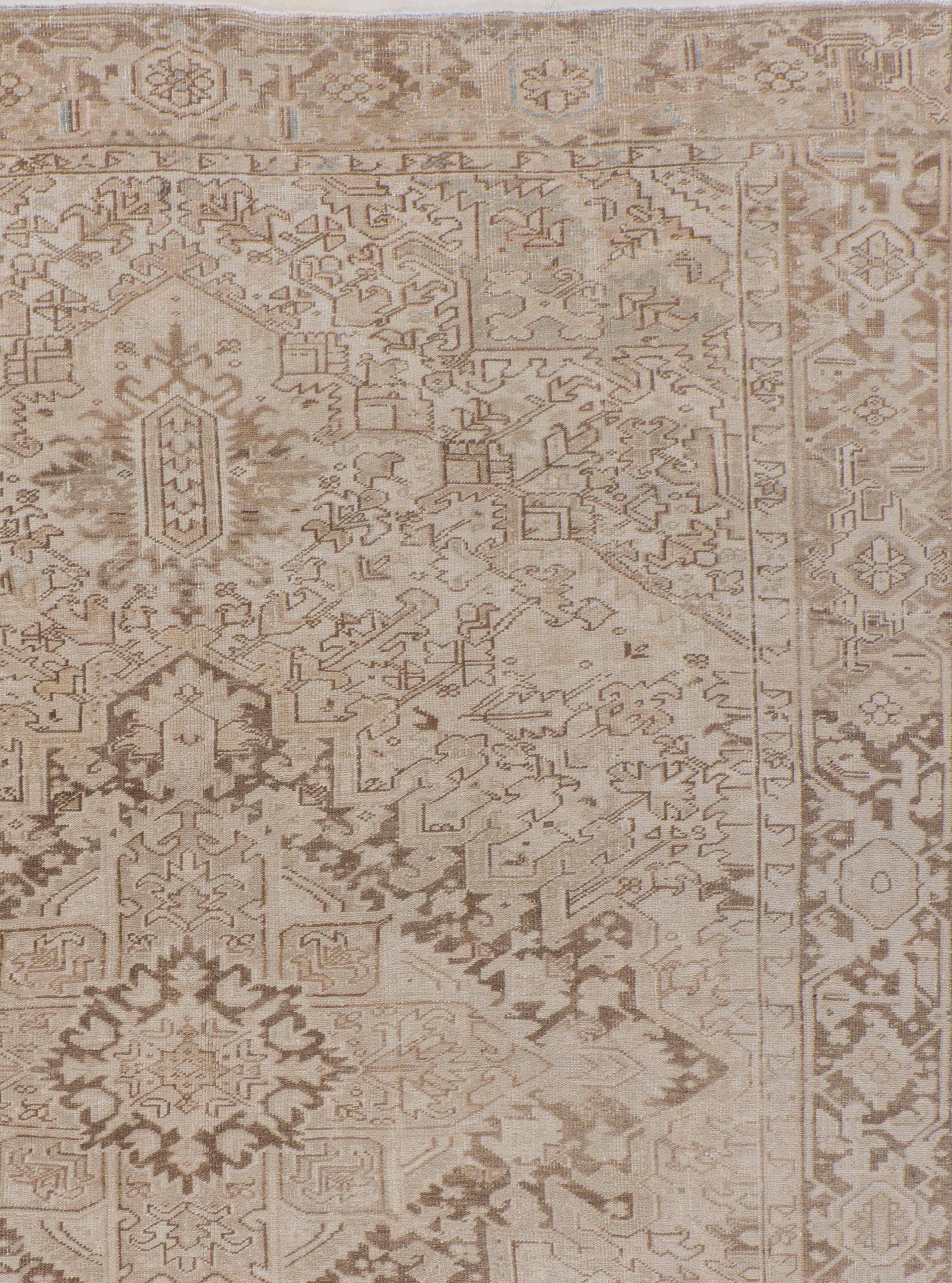1940 Vintage Persian Heriz Hand Woven Wool Beige Rug, 8'8 x 11'7. The Heriz district of NW Persia has been weaving carpets for over a century, with geometric designs and tonalities ranging from mellow to saturated. Medallion layouts are by far the