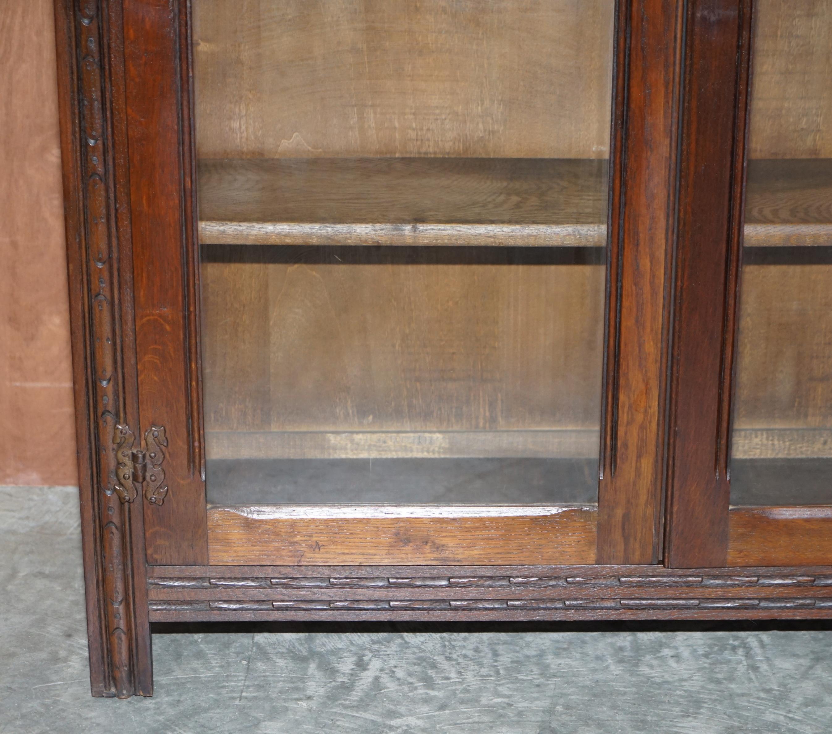 Vintage circa 1940's English Oak Jacobean Revival Glazed Door Library Bookcase For Sale 1